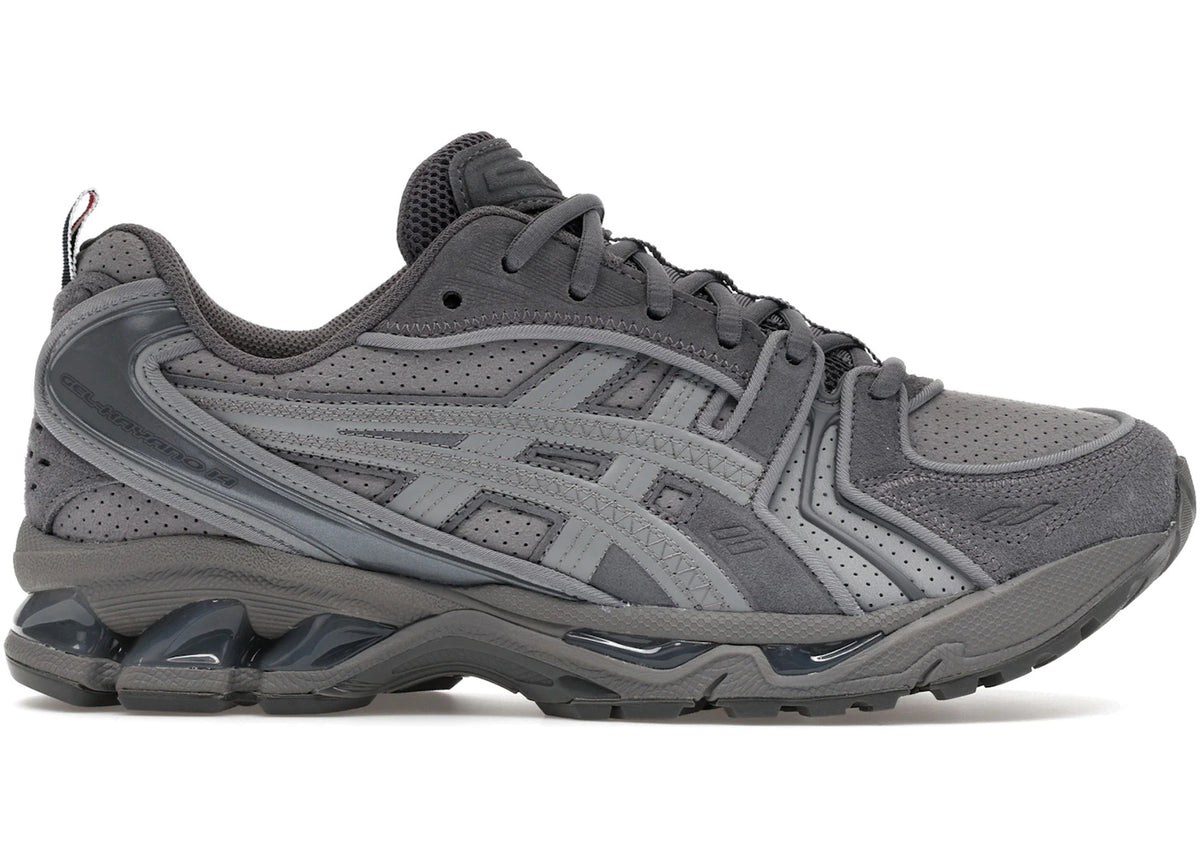 https://images.stockx.com/images/ASICS-Gel-Kayano-14-Thom-Browne-Grey-Product.jpg?fit=fill&bg=FFFFFF&w=700&h=500&fm=webp&auto=compress&q=90&dpr=2&trim=color&updated_at=1774377558