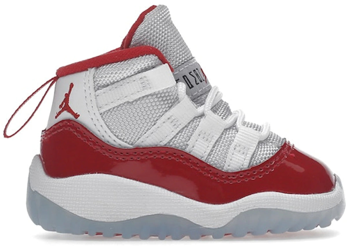 https://images.stockx.com/images/Air-Jordan-11-Retro-Cherry-2022-TD-Product.jpg?fit=fill&bg=FFFFFF&w=700&h=500&fm=webp&auto=compress&q=90&dpr=2&trim=color&updated_at=1738193358