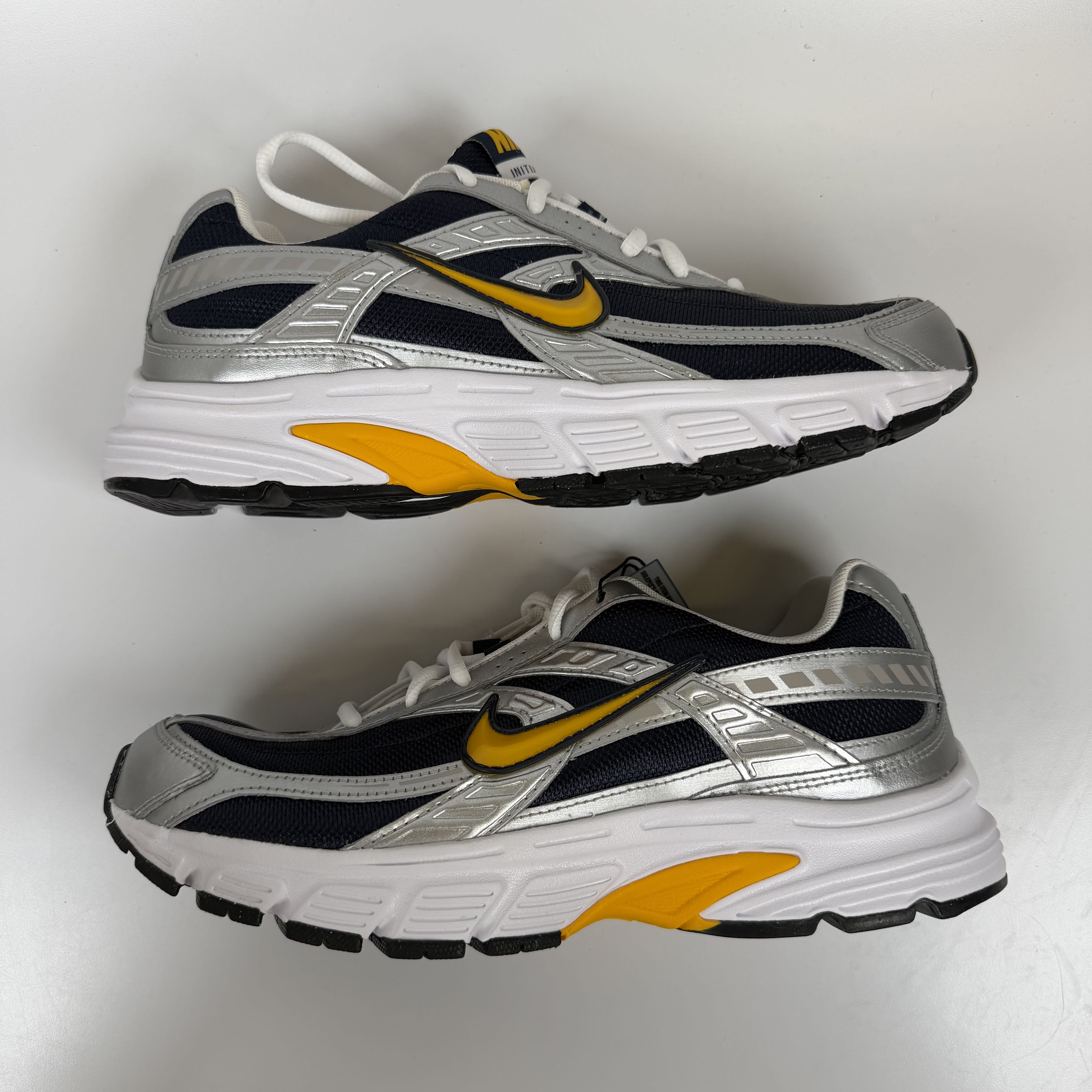 SP9140 Nike Initiator Obsidian Metallic Silver White Team Gold