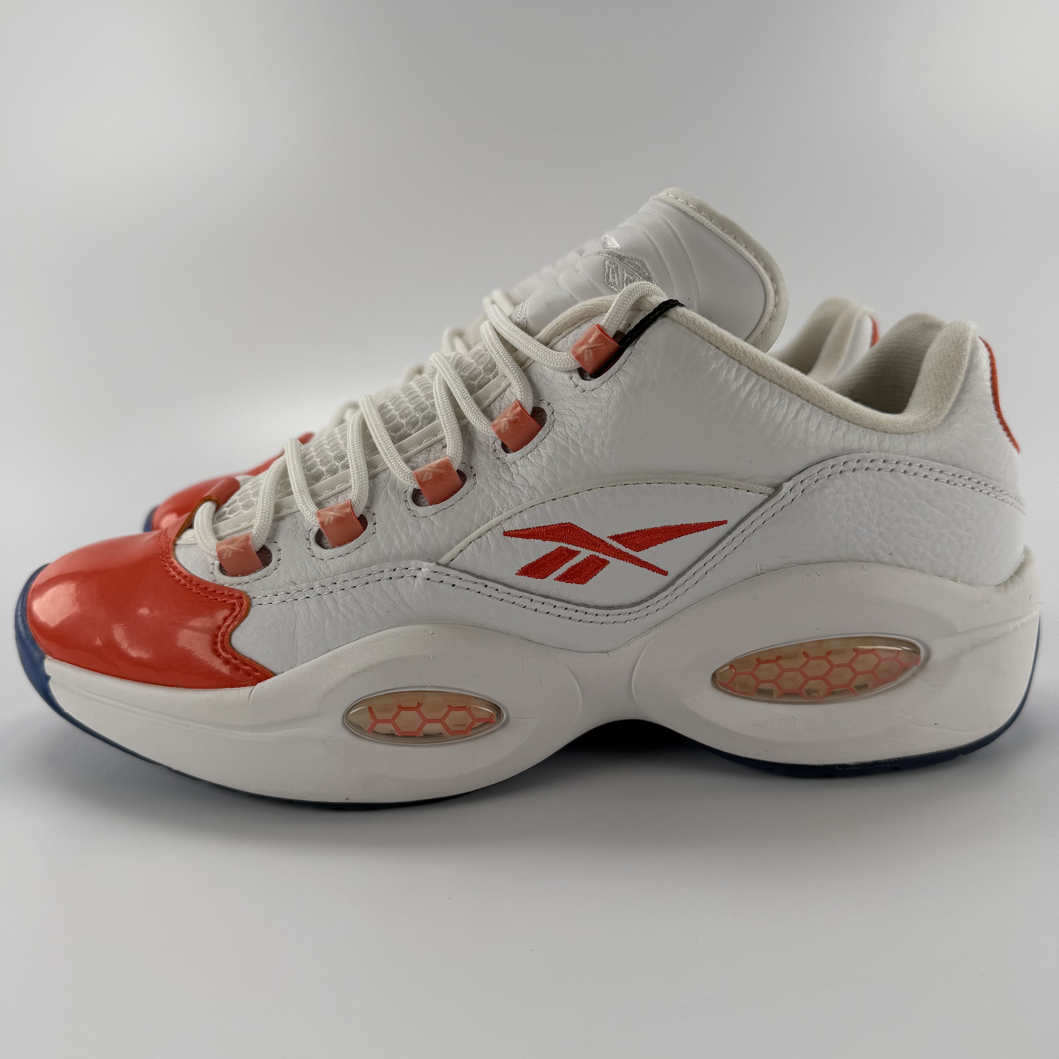 590668 Reebok Question Low Patent Toe Orange