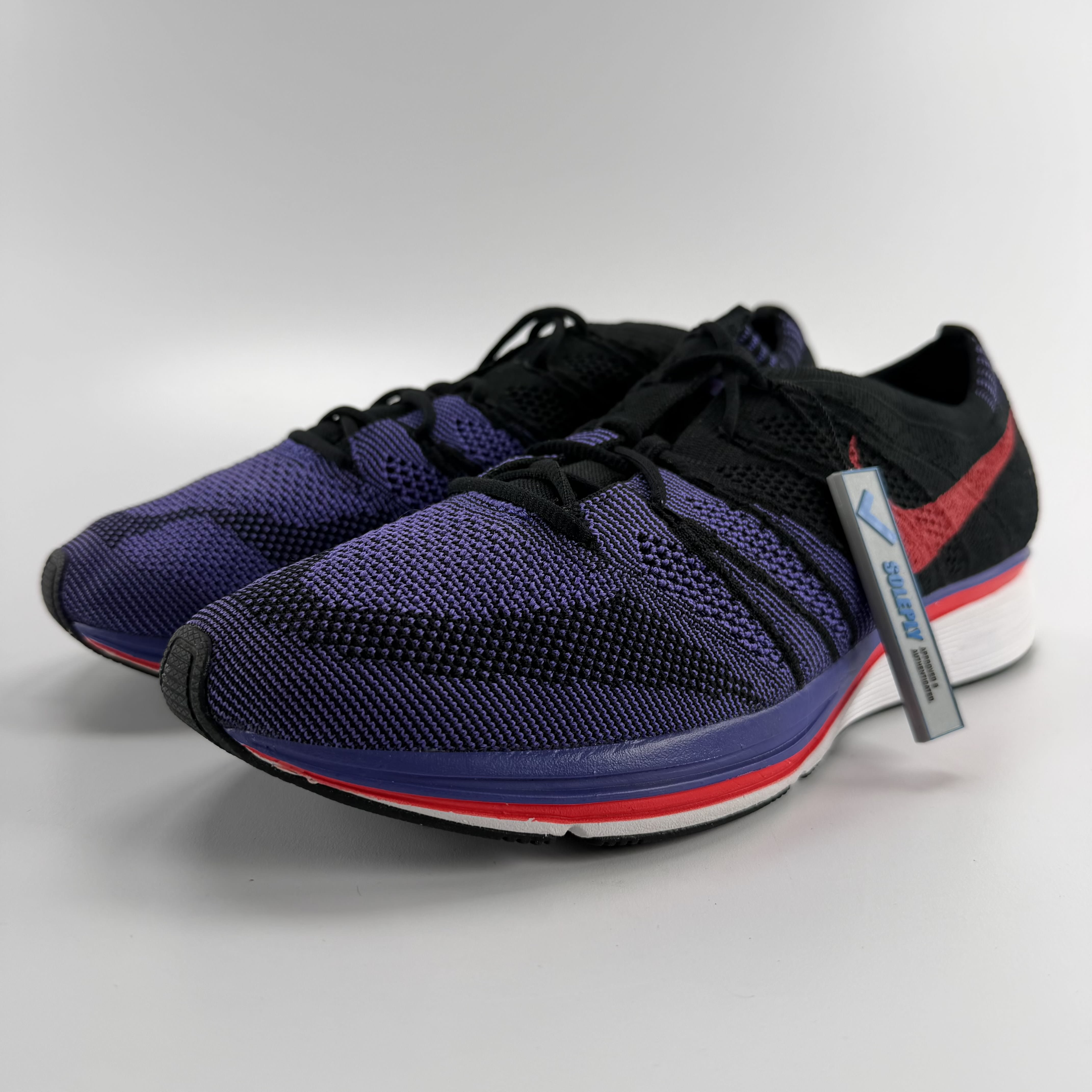 780529 Nike Flyknit Trainer Siren Red Persian Violet