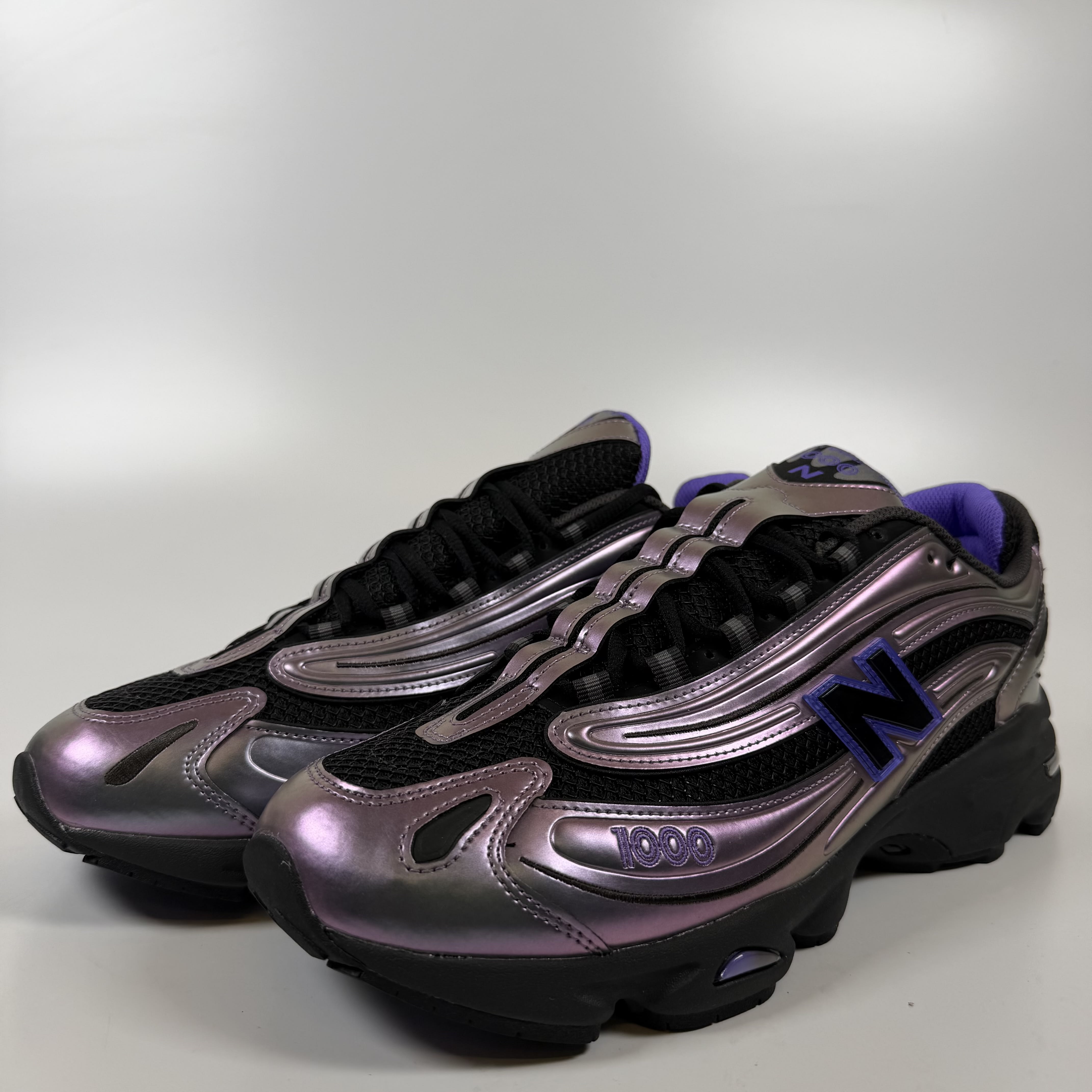SP8998 New Balance 1000 Faded Black Electric Indigo