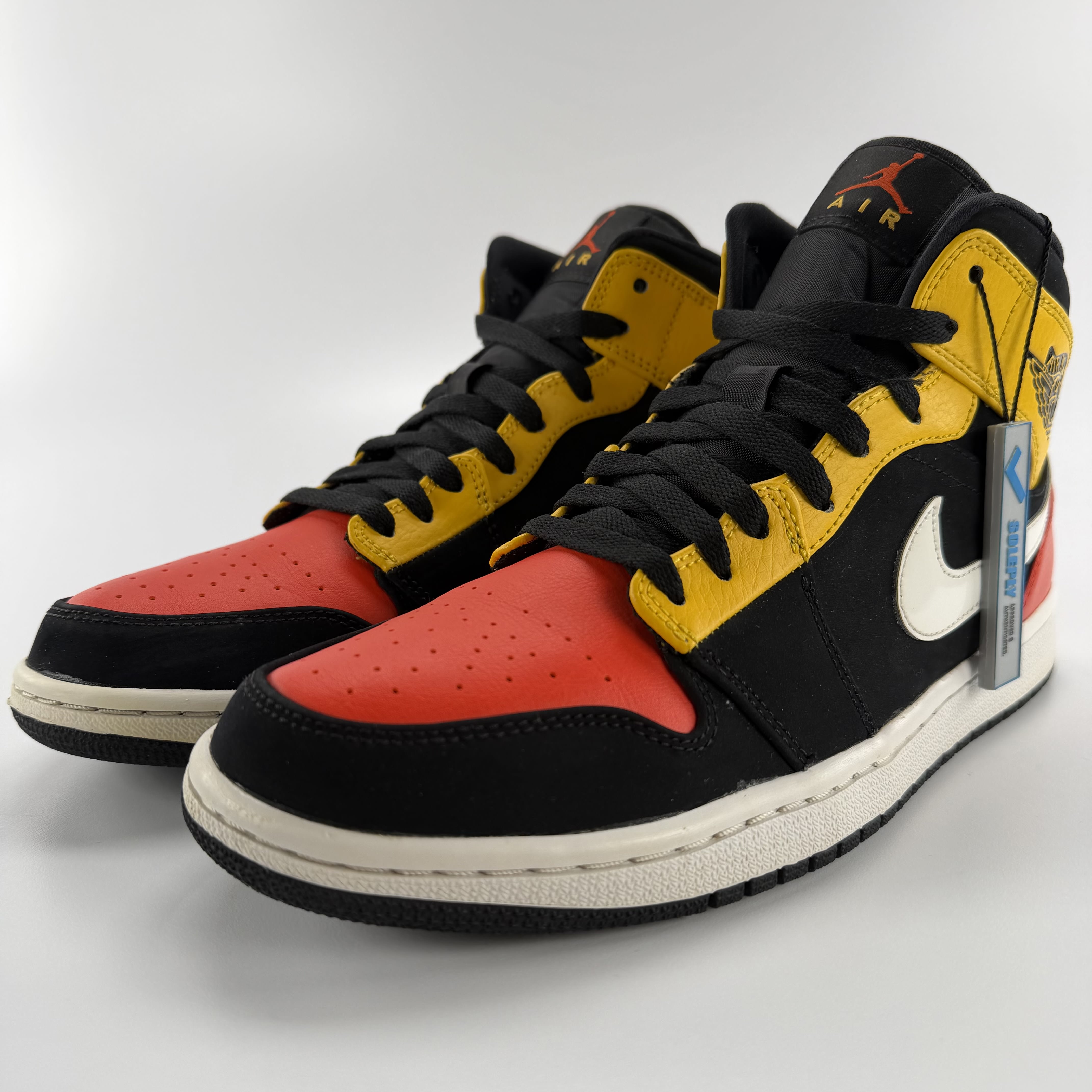 711457 Jordan 1 Mid Black Amarillo Orange