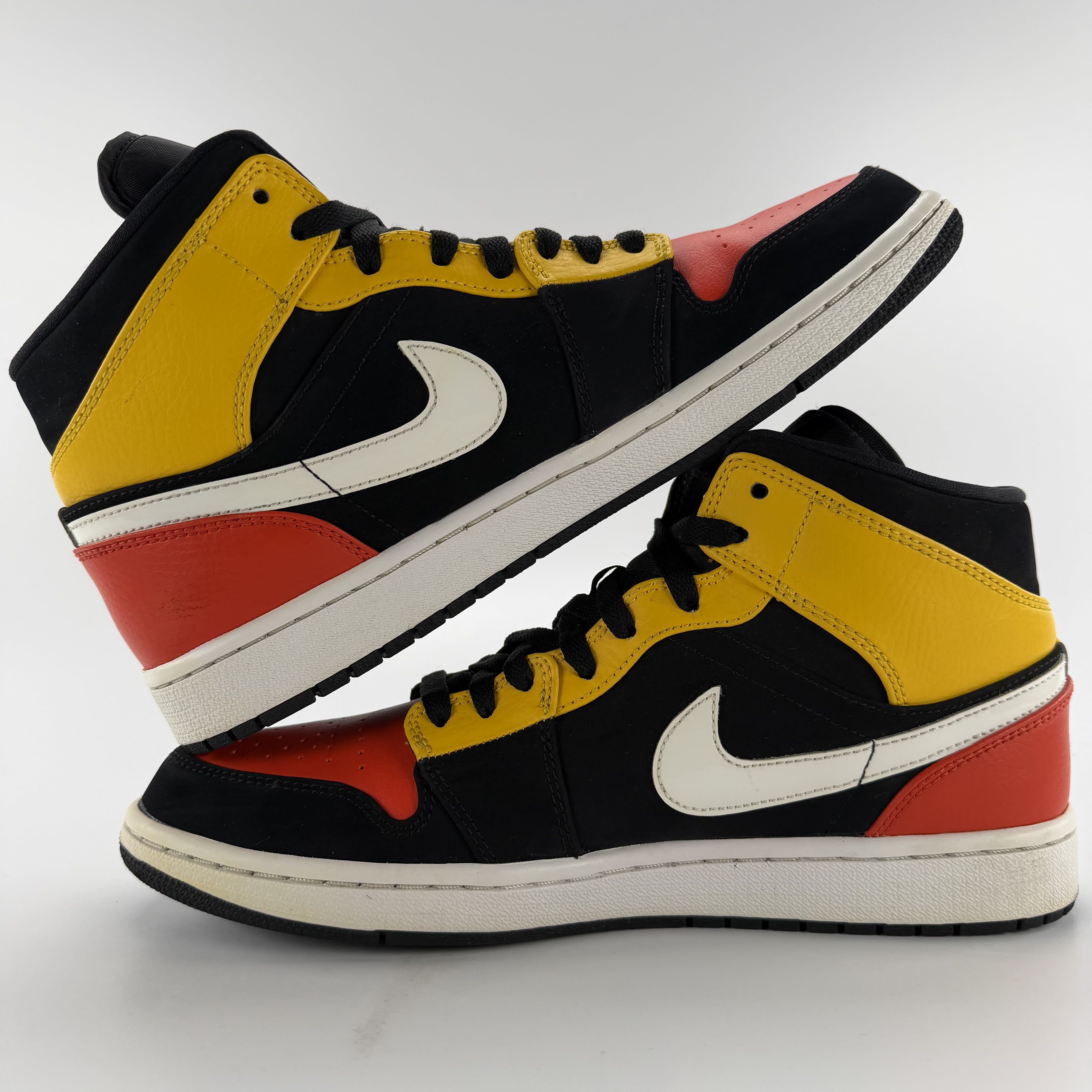 711457 Jordan 1 Mid Black Amarillo Orange