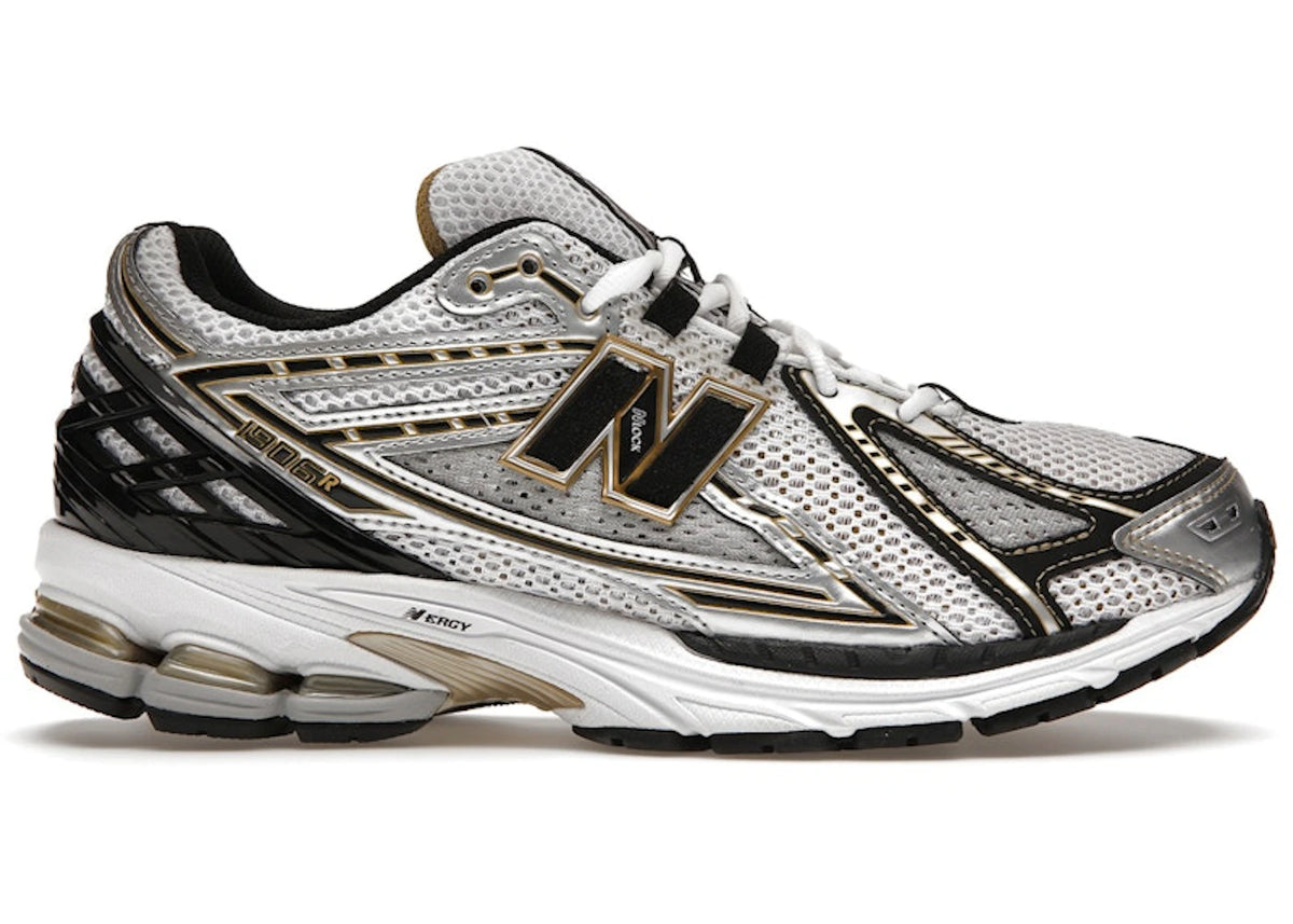 https://images.stockx.com/images/New-Balance-1906R-White-Gold-Product.jpg?fit=fill&bg=FFFFFF&w=700&h=500&fm=webp&auto=compress&q=90&dpr=2&trim=color&updated_at=1738193358