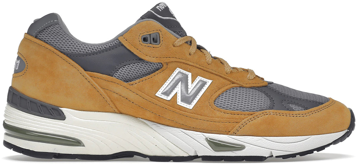 https://images.stockx.com/images/New-Balance-991-MiUK-Tan-Grey-Dark-Grey-Product.jpg?fit=fill&bg=FFFFFF&w=1000&fm=webp&auto=compress&q=90&dpr=2&trim=color&updated_at=1738193358