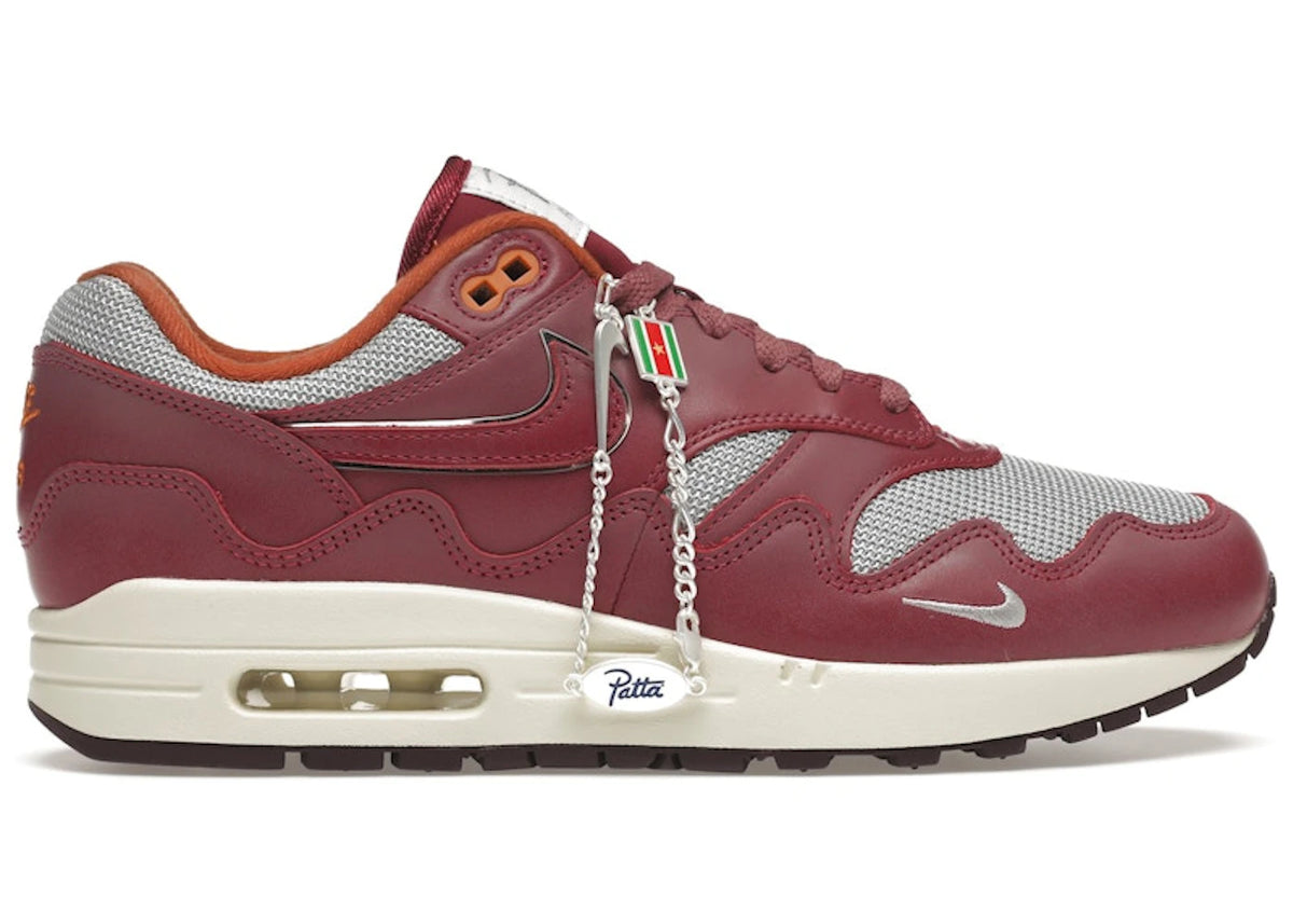 https://images.stockx.com/images/Nike-Air-Max-1-Patta-Waves-Rush-Maroon-with-Bracelet-Product.jpg?fit=fill&bg=FFFFFF&w=700&h=500&fm=webp&auto=compress&q=90&dpr=2&trim=color&updated_at=1738193358