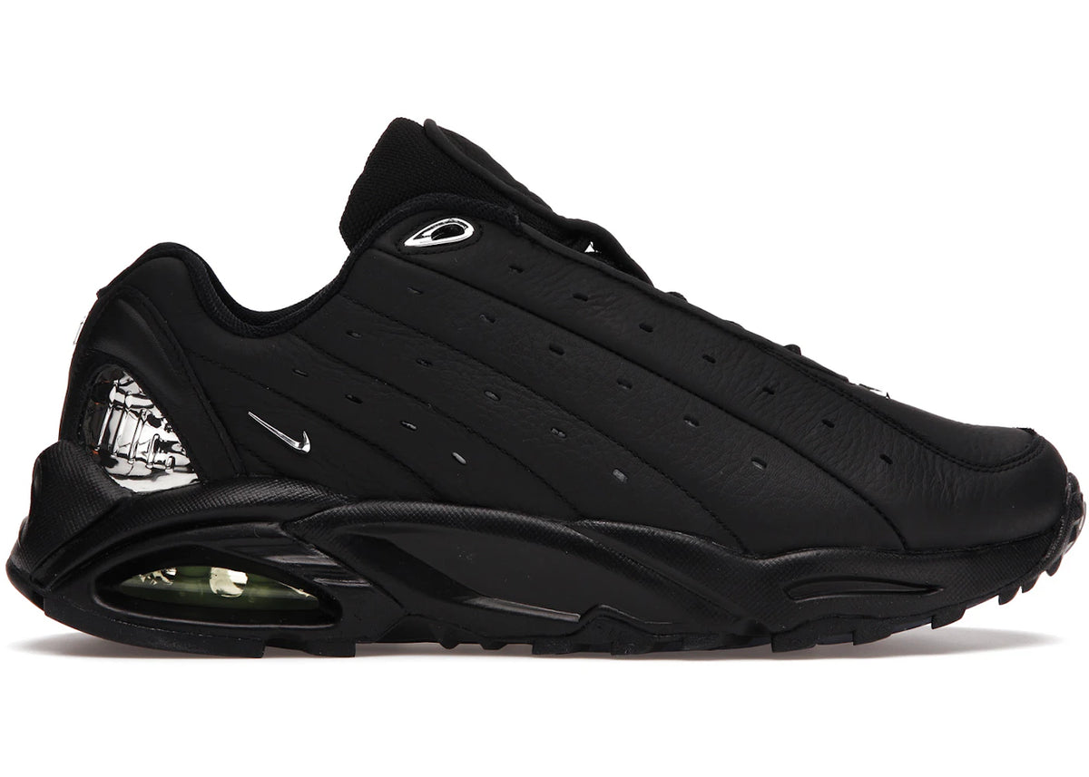 https://images.stockx.com/images/Nike-Hot-Step-Air-Terra-Drake-NOCTA-Black-Product.jpg?fit=fill&bg=FFFFFF&w=700&h=500&fm=webp&auto=compress&q=90&dpr=2&trim=color&updated_at=1738193358
