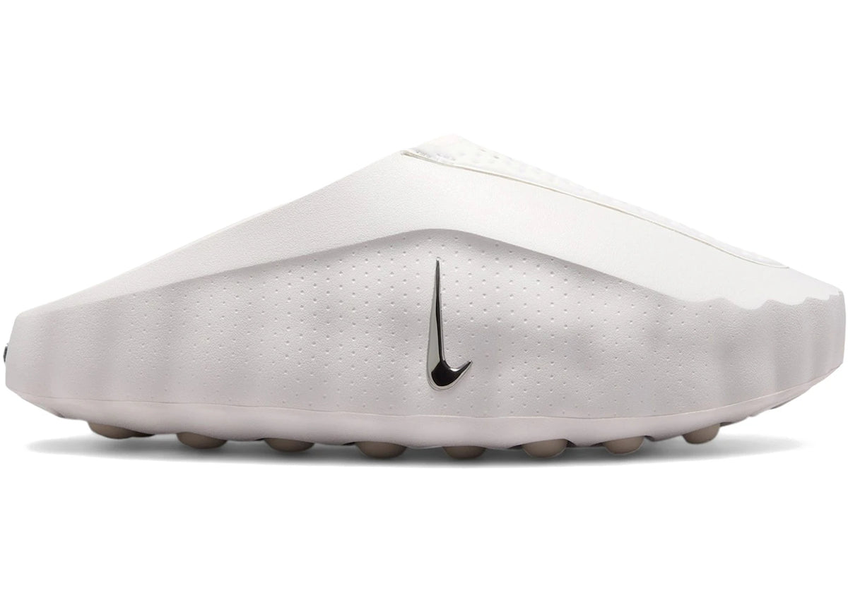 https://images.stockx.com/images/Nike-Mind-001-Slide-Summit-White-Womens.jpg?fit=fill&bg=FFFFFF&w=700&h=500&fm=webp&auto=compress&q=90&dpr=2&trim=color&updated_at=1781122321
