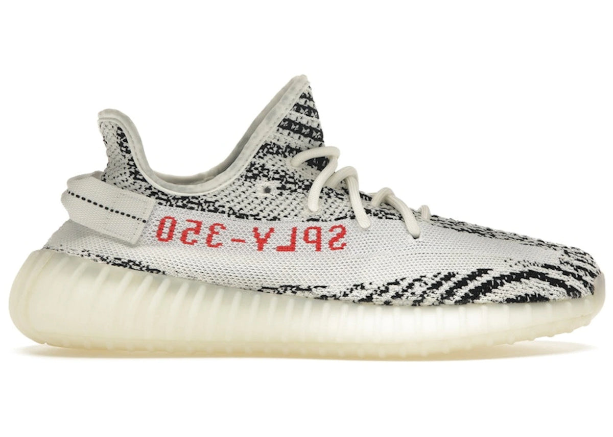 https://images.stockx.com/images/adidas-Yeezy-Boost-350-V2-Zebra-Product.jpg?fit=fill&bg=FFFFFF&w=700&h=500&fm=webp&auto=compress&q=90&dpr=2&trim=color&updated_at=1784301415
