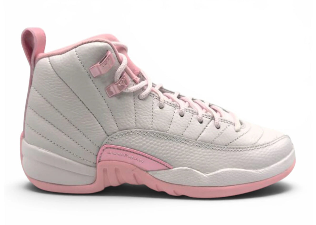https://images.stockx.com/images/Air-Jordan-12-Retro-Pearl-Pink-GS-Product.jpg?fit=fill&bg=FFFFFF&w=700&h=500&fm=webp&auto=compress&q=90&dpr=2&trim=color&updated_at=1779388482