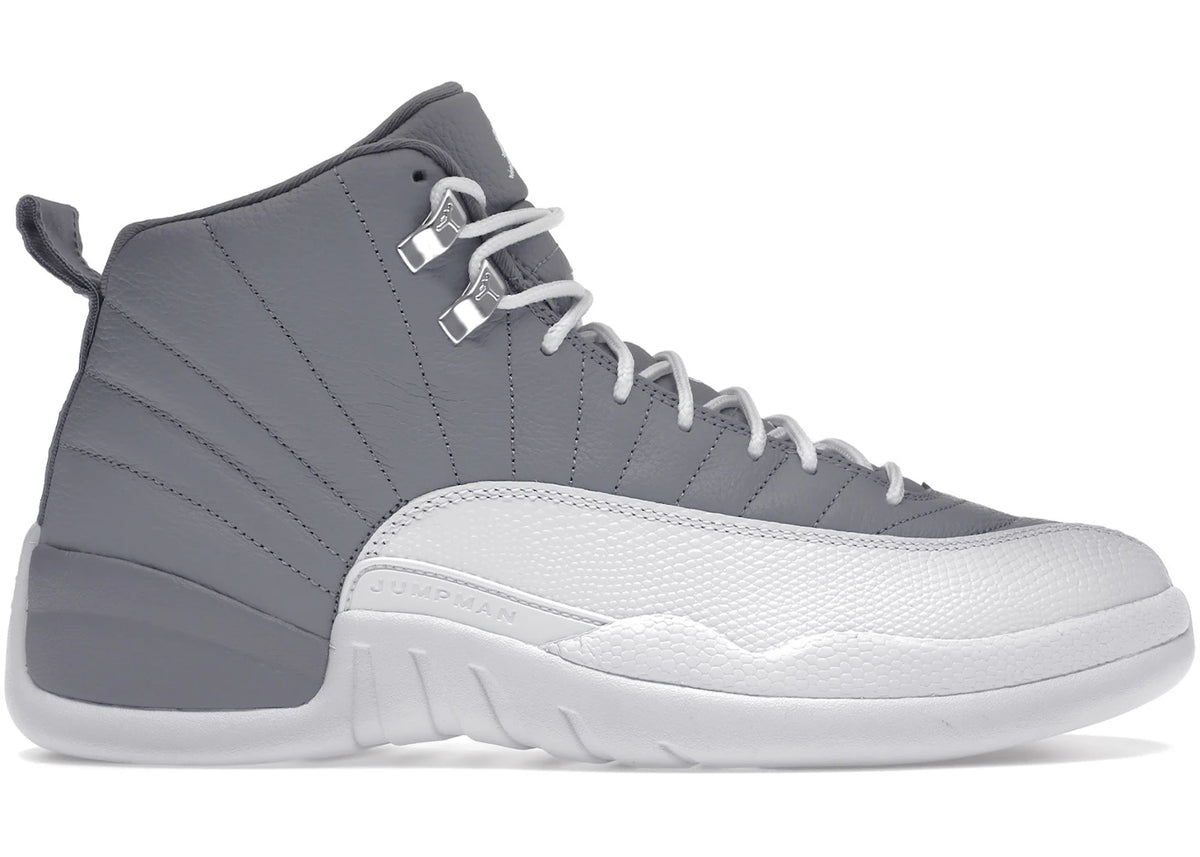https://images.stockx.com/images/Air-Jordan-12-Retro-Stealth-Product.jpg?fit=fill&bg=FFFFFF&w=700&h=500&fm=webp&auto=compress&q=90&dpr=2&trim=color&updated_at=1738193358