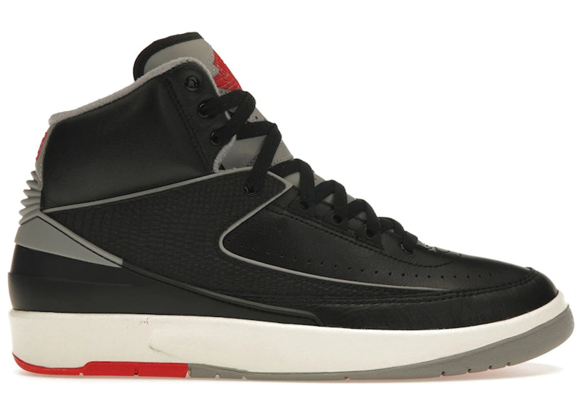 https://images.stockx.com/images/Air-Jordan-2-Retro-Black-Cement-Product.jpg?fit=fill&bg=FFFFFF&w=700&h=500&fm=webp&auto=compress&q=90&dpr=2&trim=color&updated_at=1784670115