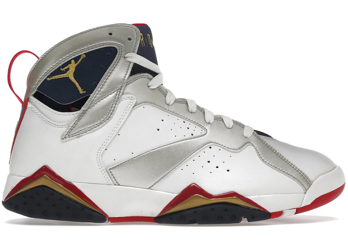 https://images.stockx.com/images/Air-Jordan-7-Retro-Olympic-2004-Product.jpg?fit=fill&bg=FFFFFF&w=700&h=500&fm=webp&auto=compress&q=90&dpr=2&trim=color&updated_at=1738193358