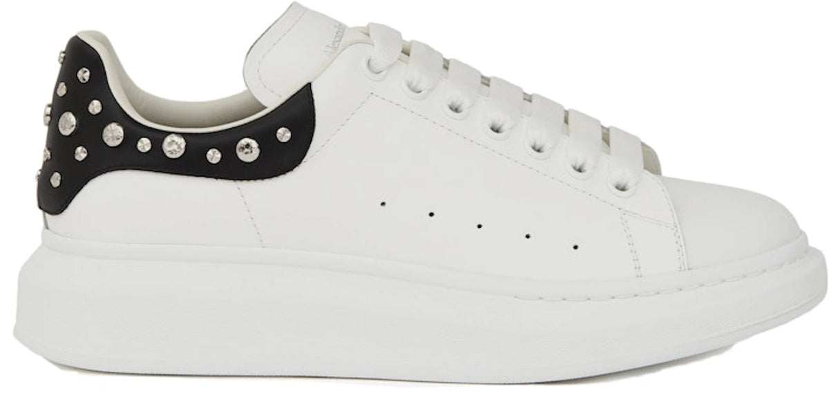 https://images.stockx.com/images/Alexander-McQueen-Oversized-White-Studd.jpg?fit=fill&bg=FFFFFF&w=1000&fm=webp&auto=compress&q=90&dpr=2&trim=color&updated_at=1784583409