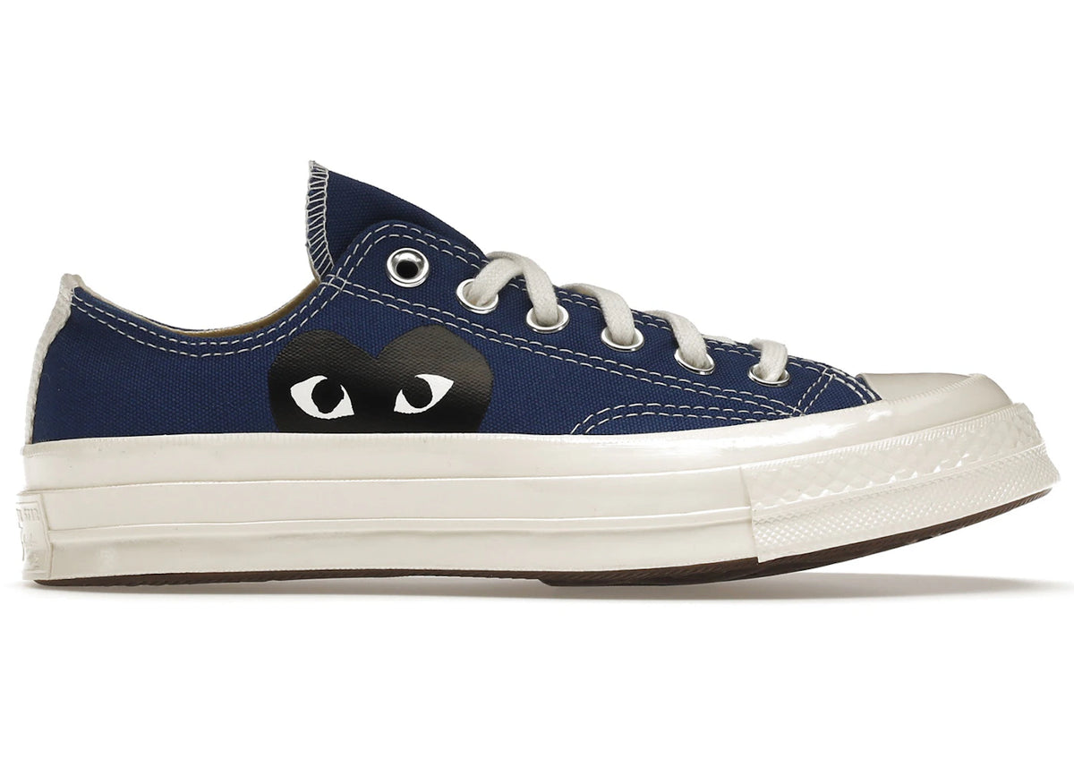 https://images.stockx.com/images/Converse-Chuck-Taylor-All-Star-70s-Ox-Comme-des-Garcons-PLAY-Blue-Product.jpg?fit=fill&bg=FFFFFF&w=700&h=500&fm=webp&auto=compress&q=90&dpr=2&trim=color&updated_at=1738193358