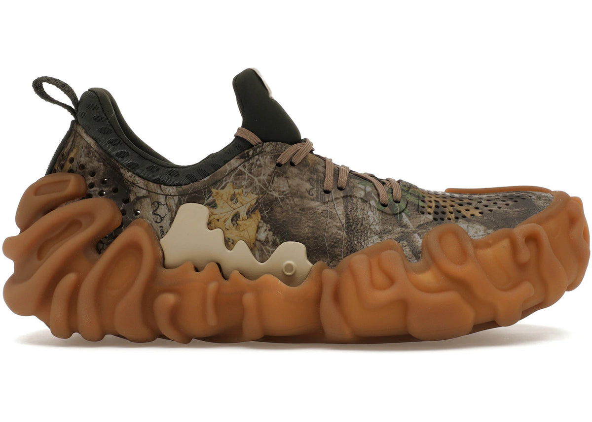 https://images.stockx.com/images/Crocs-Pollex-Juniper-by-Salehe-Bembury-Real-Tree-Camo-Product.jpg?fit=fill&bg=FFFFFF&w=700&h=500&fm=webp&auto=compress&q=90&dpr=2&trim=color&updated_at=1755096854