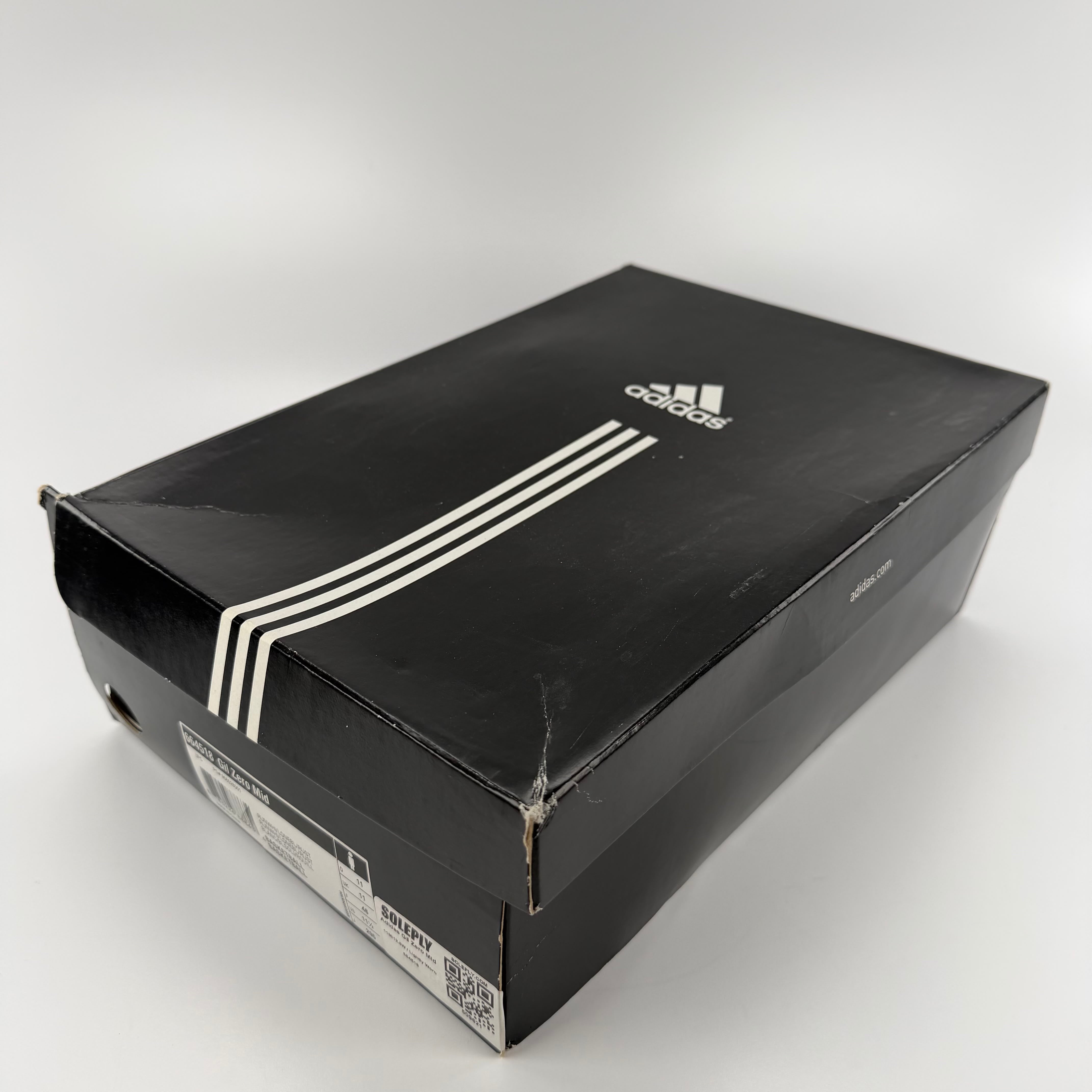 509621 Adidas Gil Zero Mid