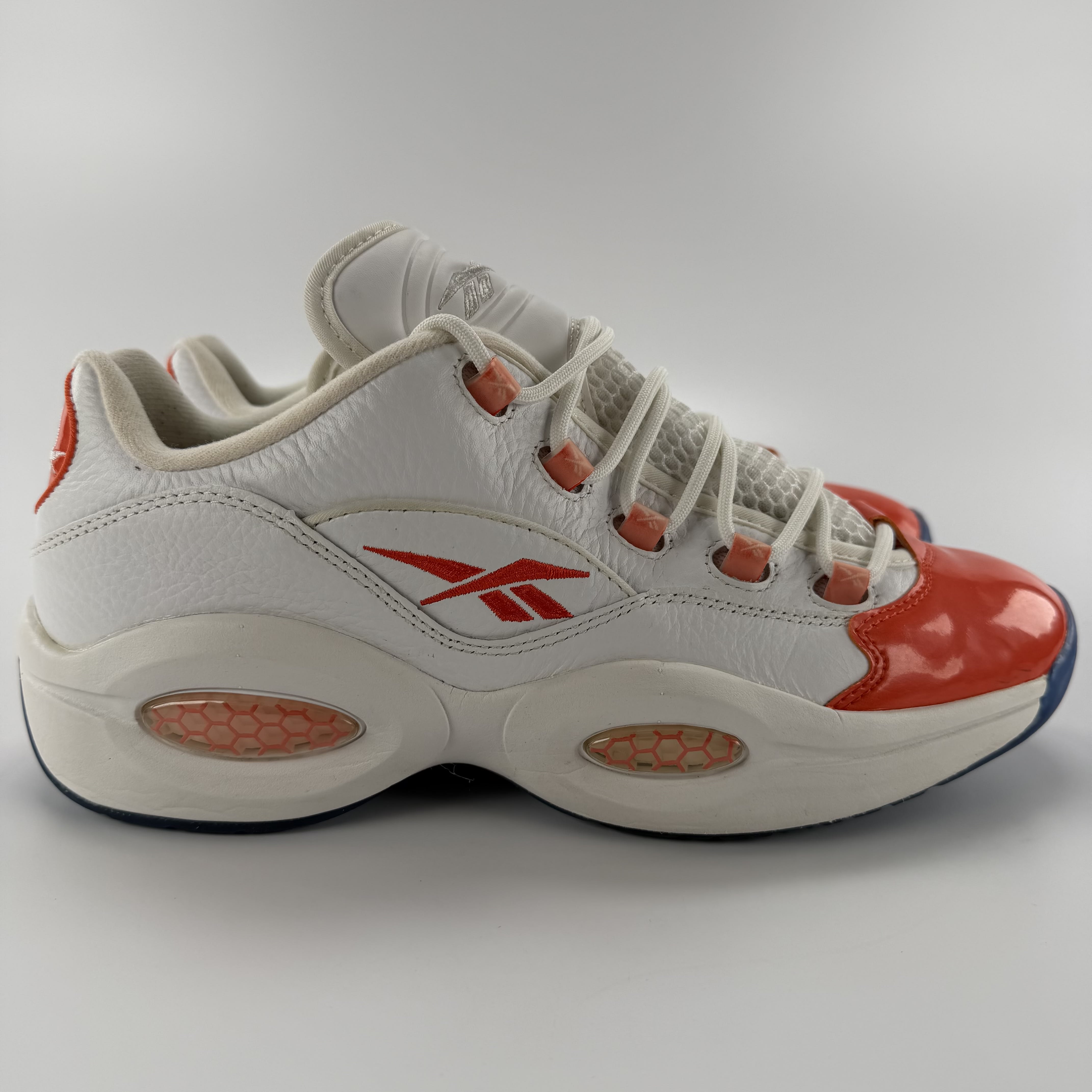 590668 Reebok Question Low Patent Toe Orange