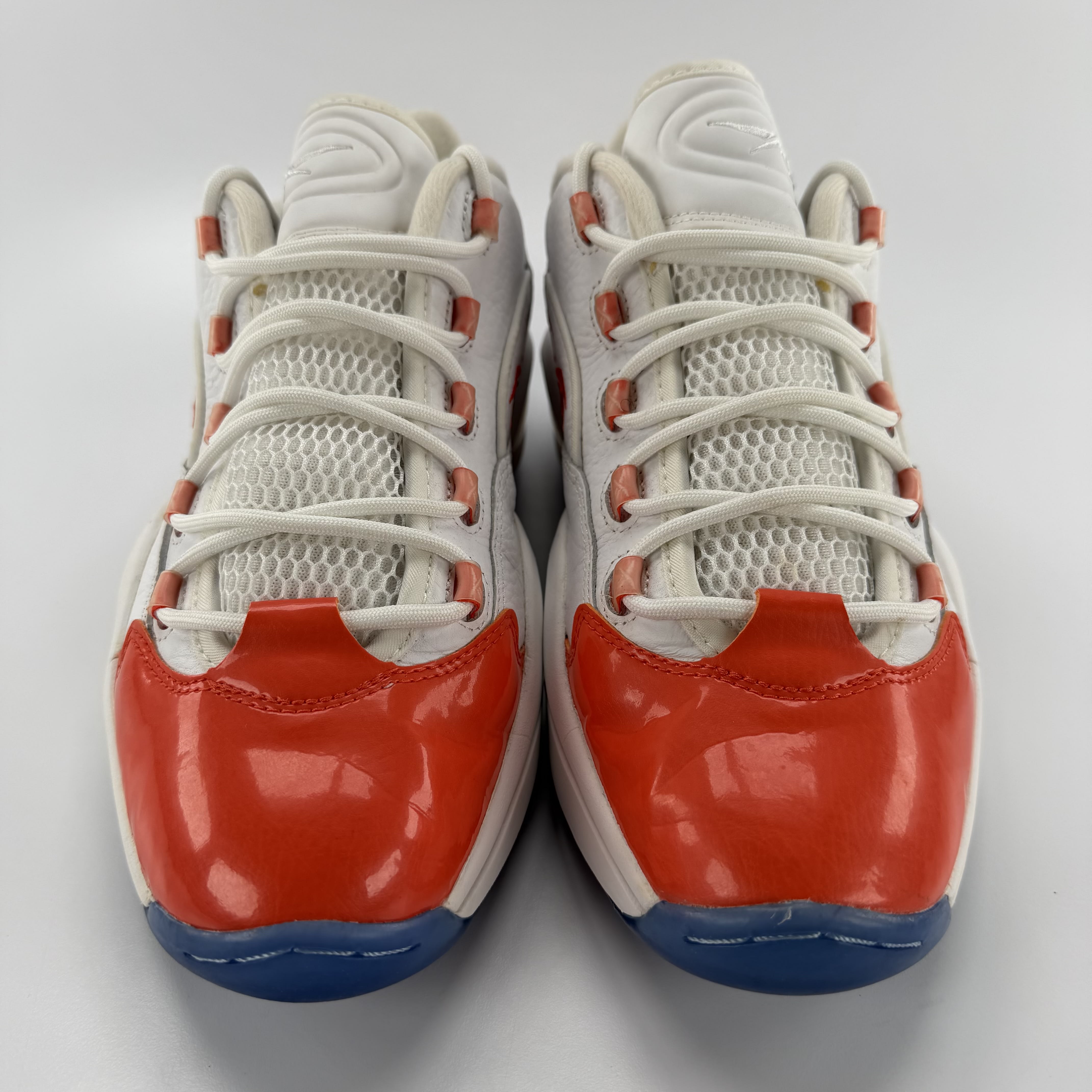 590668 Reebok Question Low Patent Toe Orange