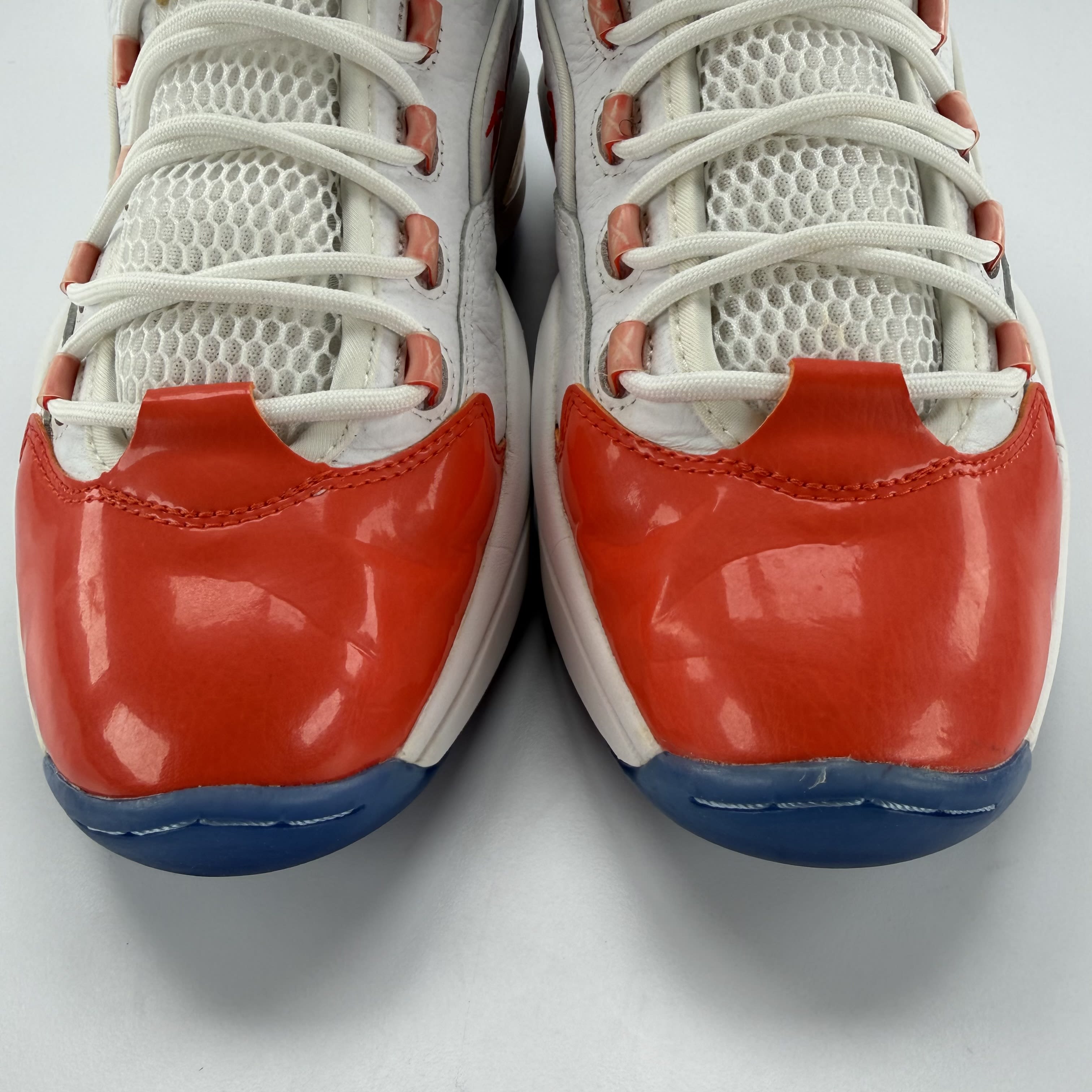 590668 Reebok Question Low Patent Toe Orange