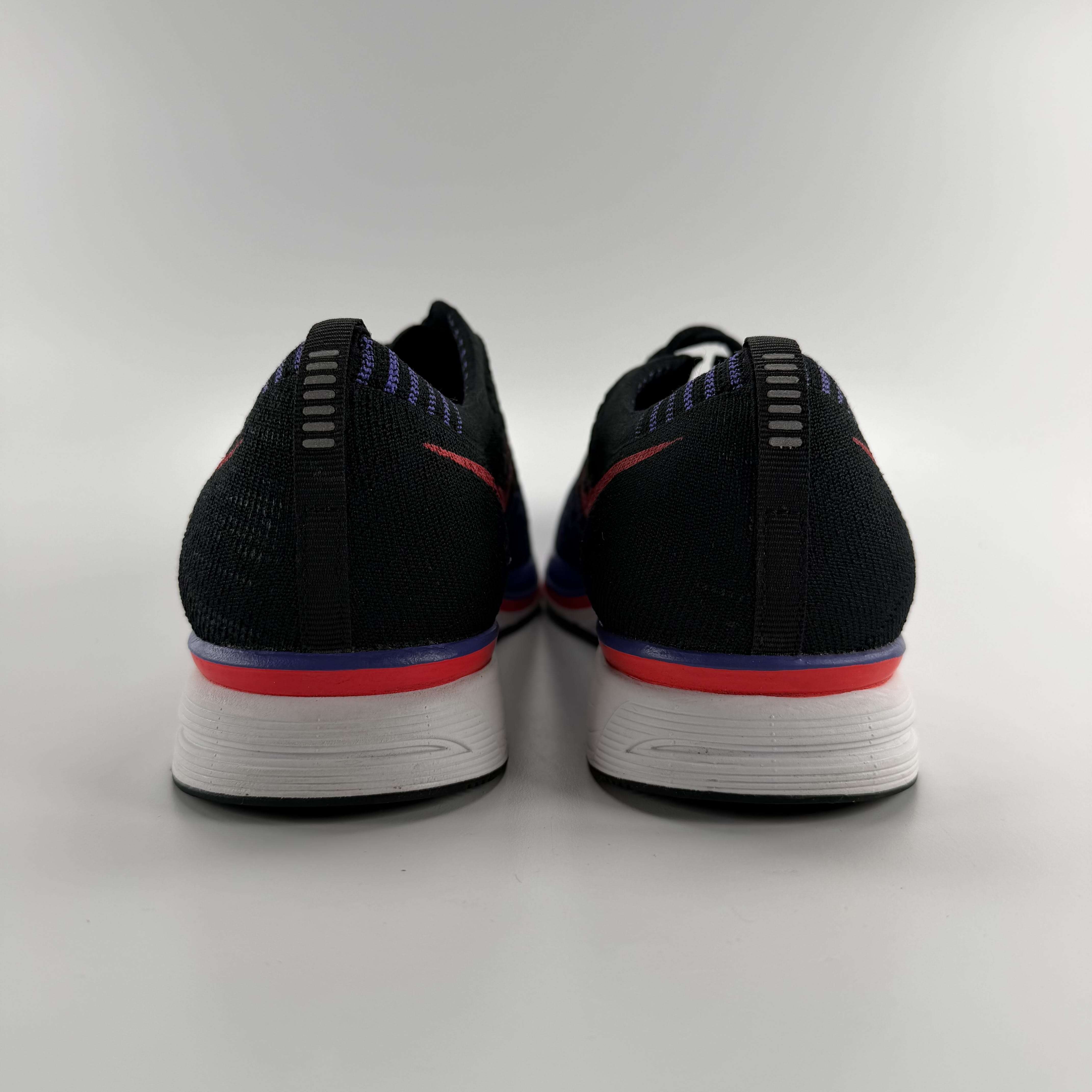 780529 Nike Flyknit Trainer Siren Red Persian Violet