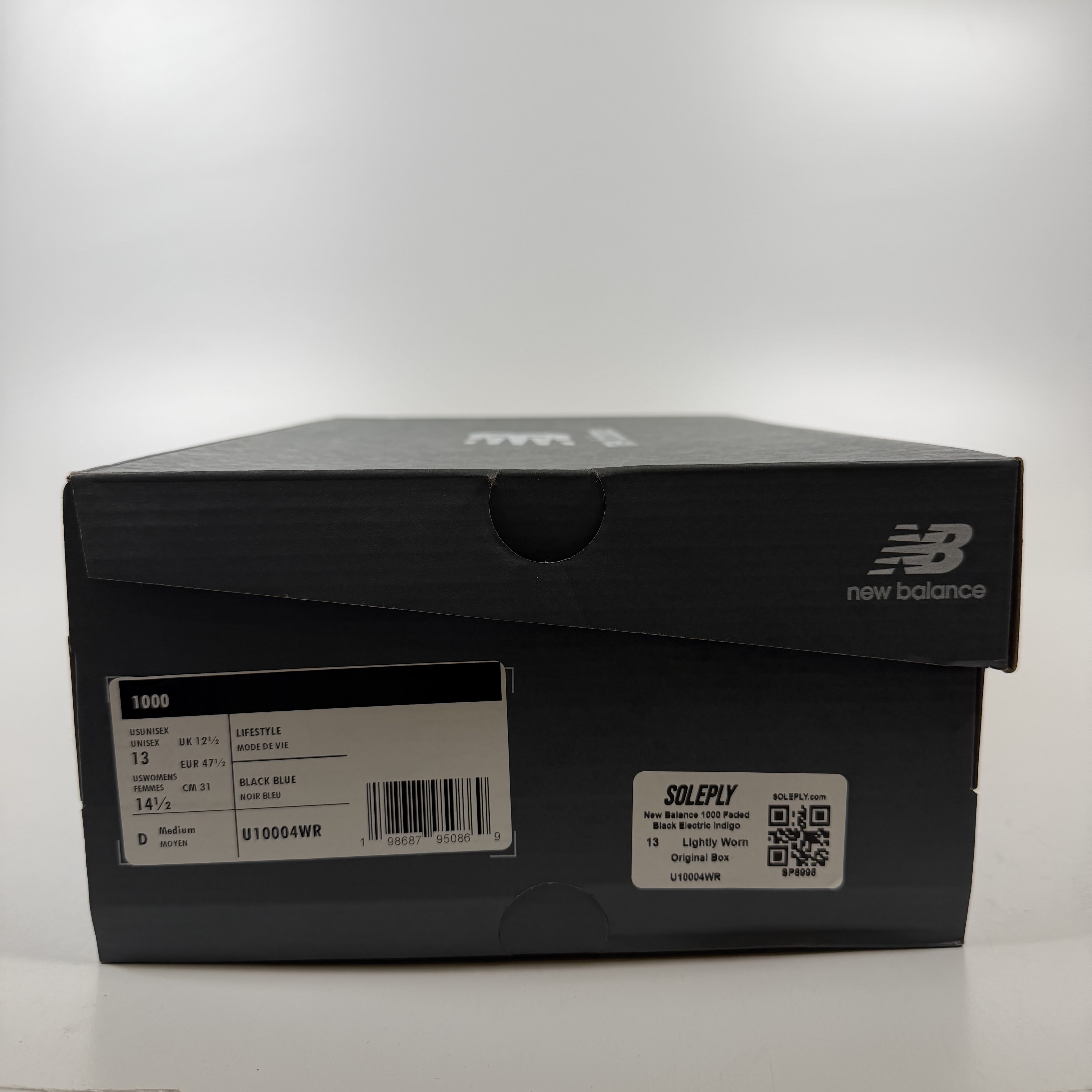 SP8998 New Balance 1000 Faded Black Electric Indigo