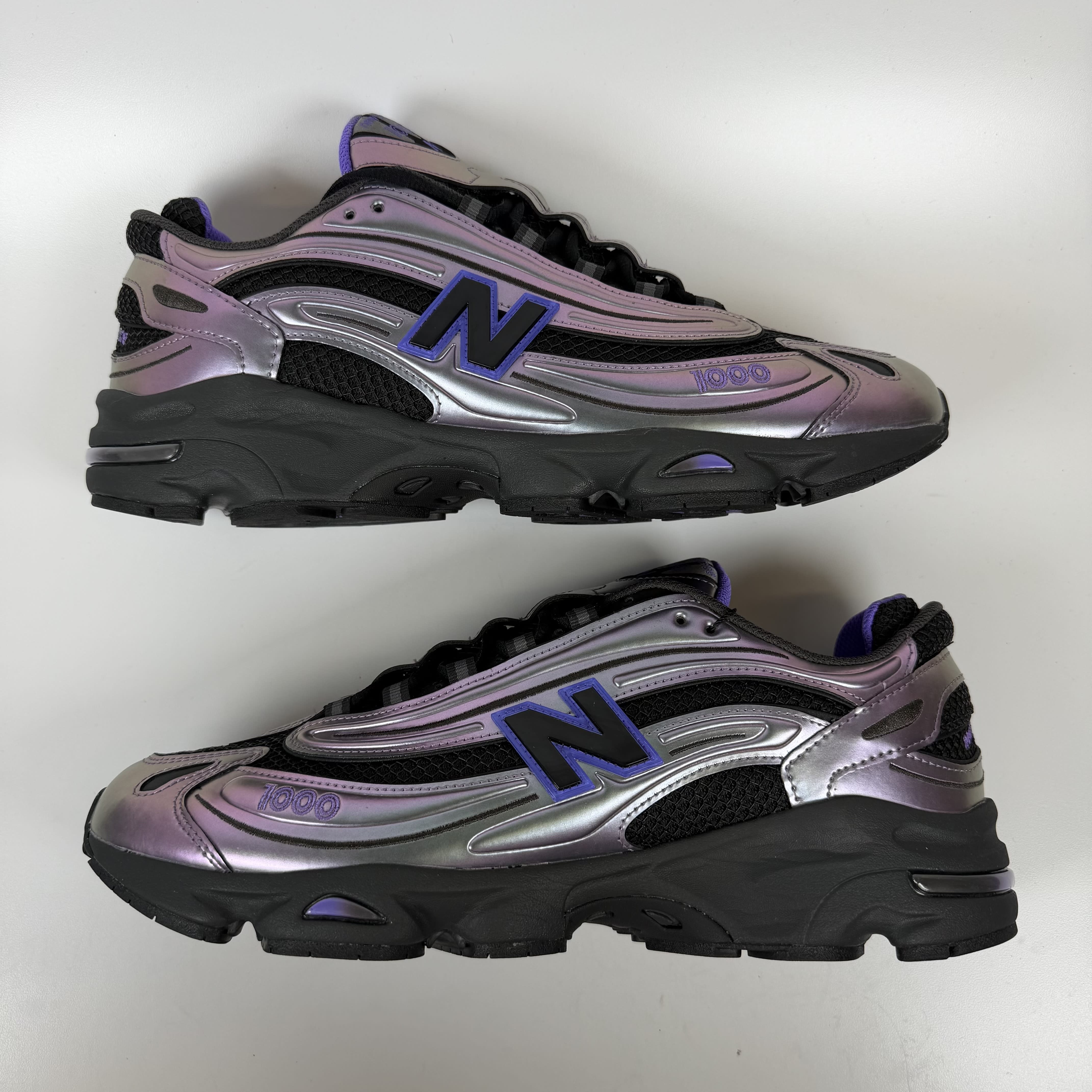 SP8998 New Balance 1000 Faded Black Electric Indigo