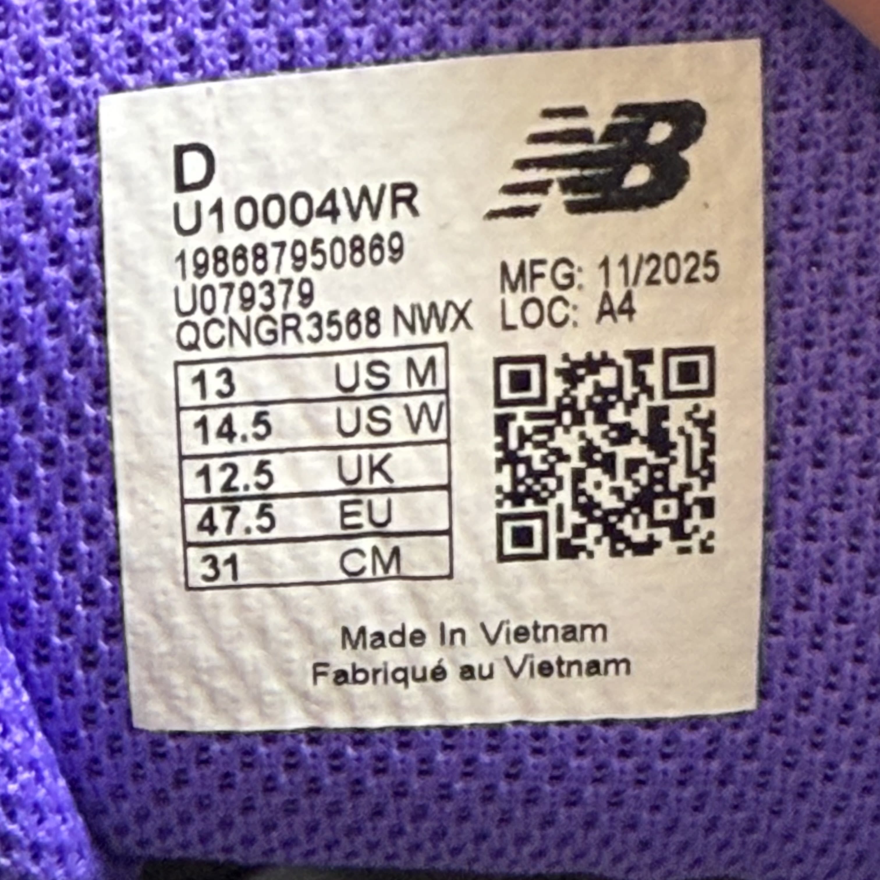SP8998 New Balance 1000 Faded Black Electric Indigo