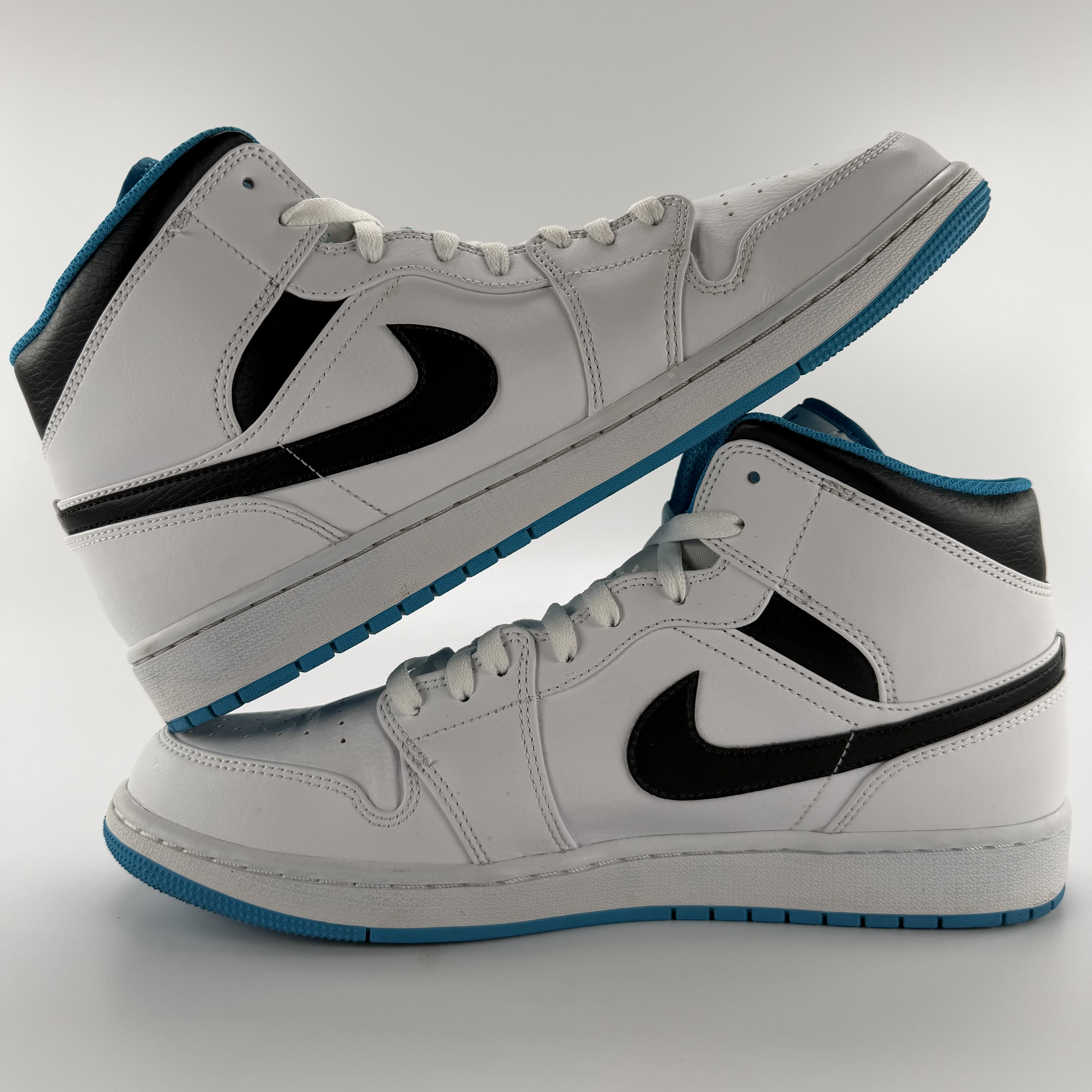 694813 Jordan 1 Mid Laser Blue