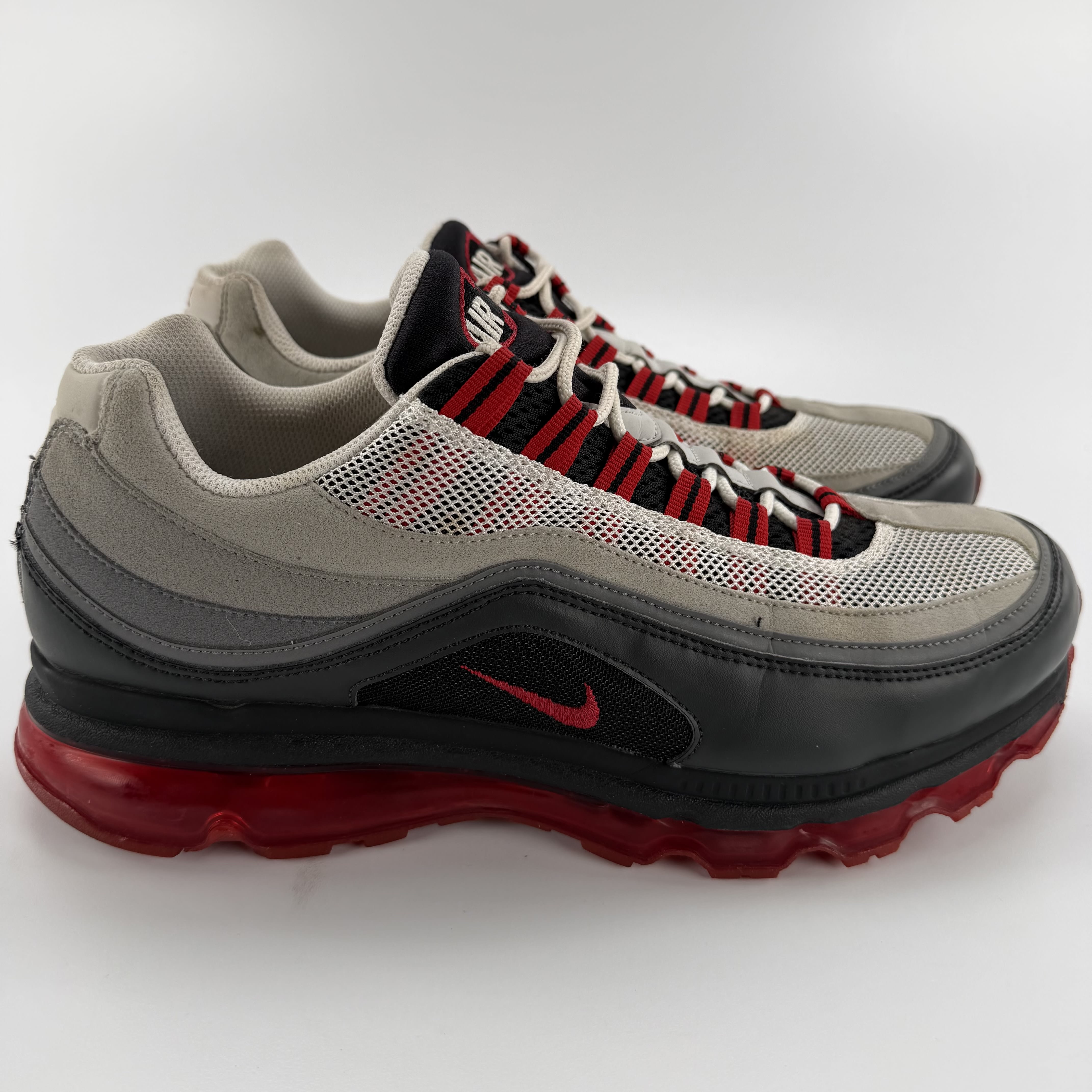 820685 Nike Air Max 24-7 'Black Grey Red'
