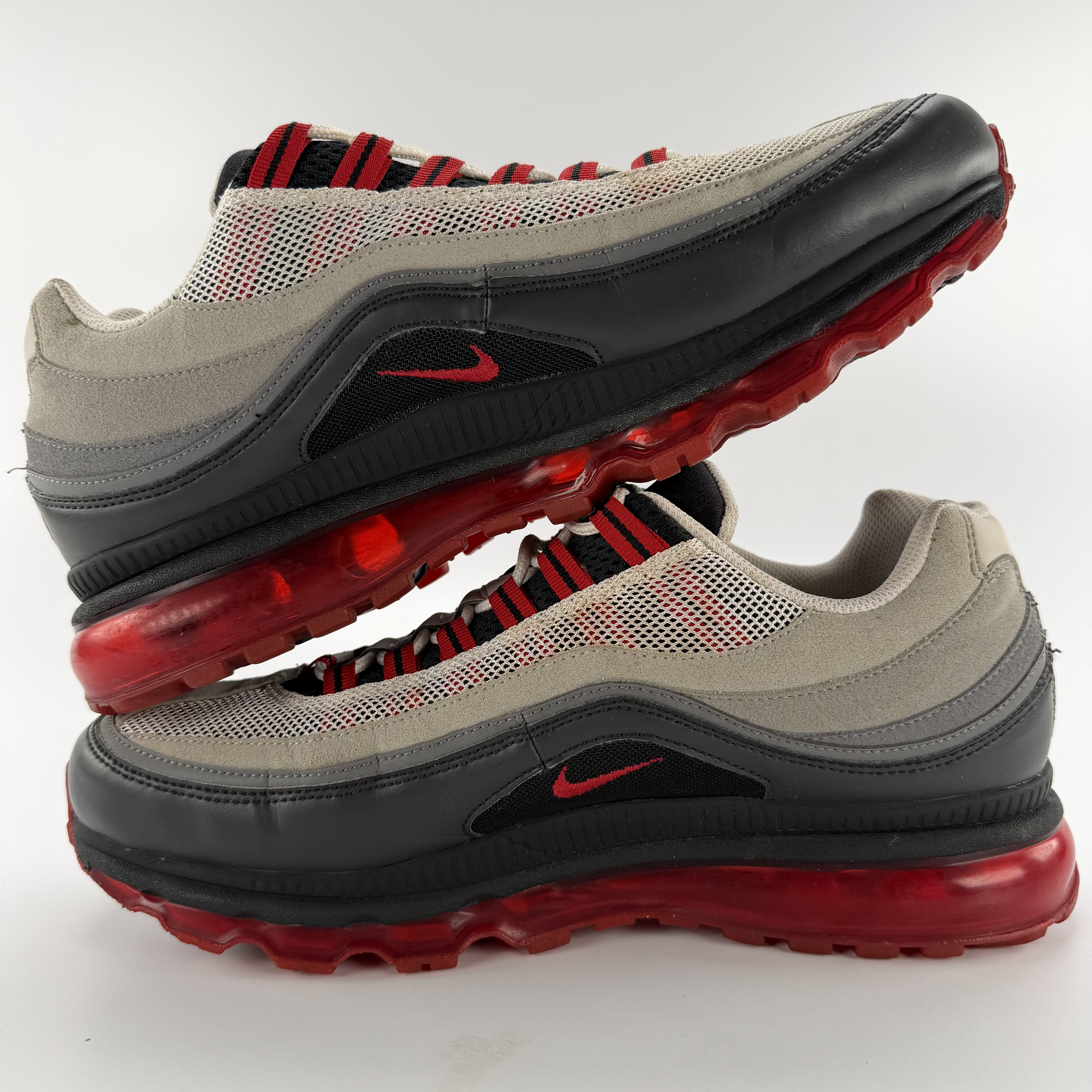820685 Nike Air Max 24-7 'Black Grey Red'