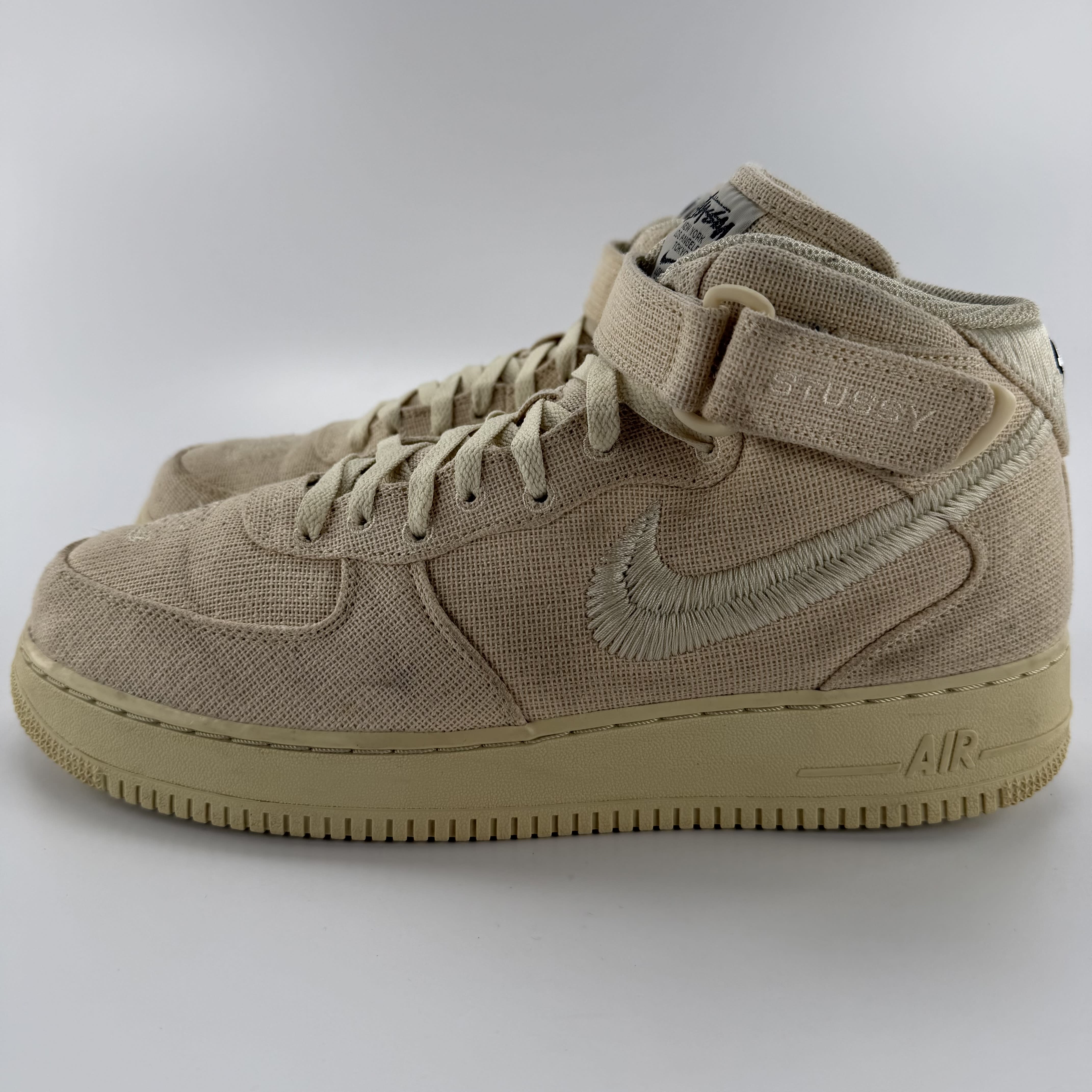 766852 Nike Air Force 1 Mid Stussy Fossil