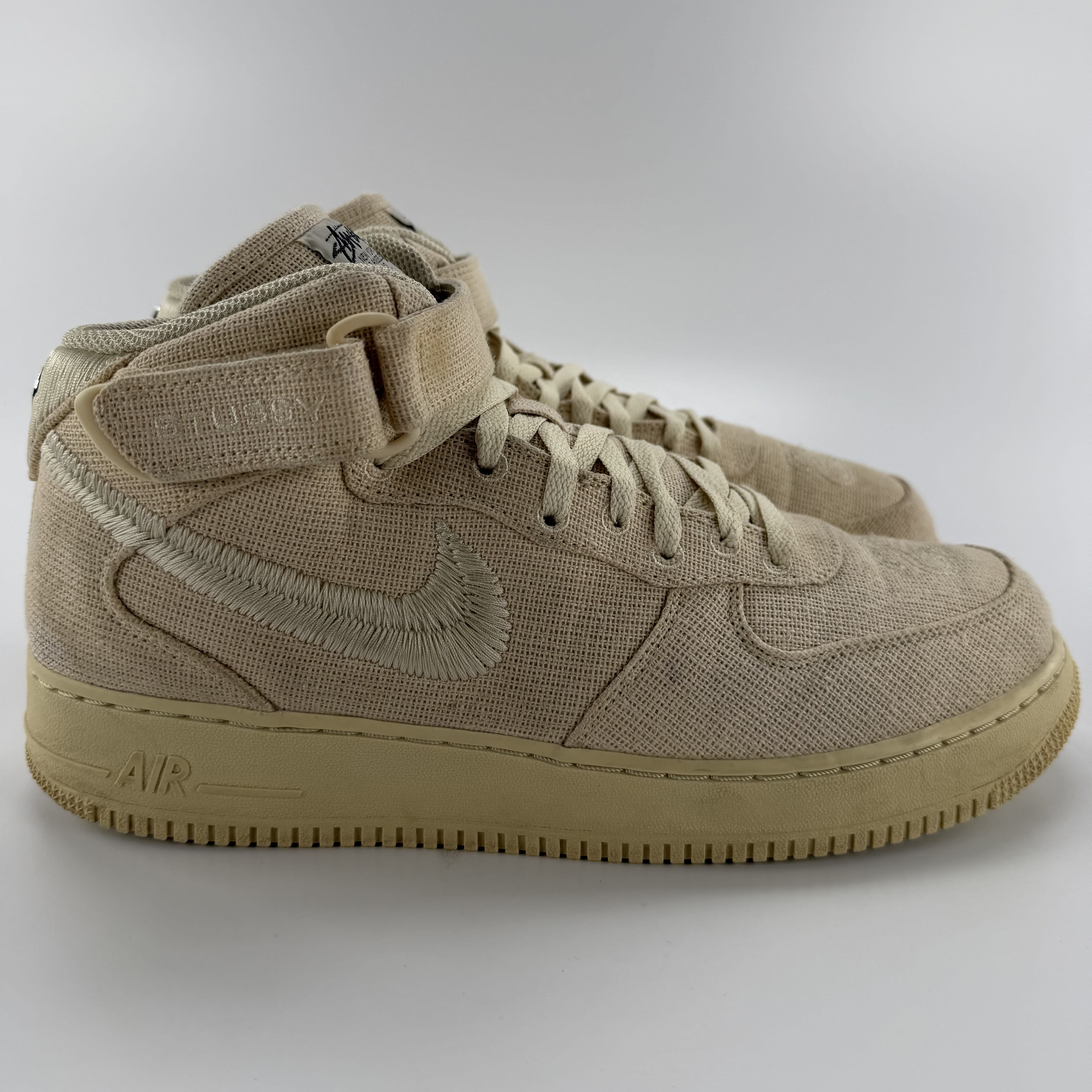 766852 Nike Air Force 1 Mid Stussy Fossil