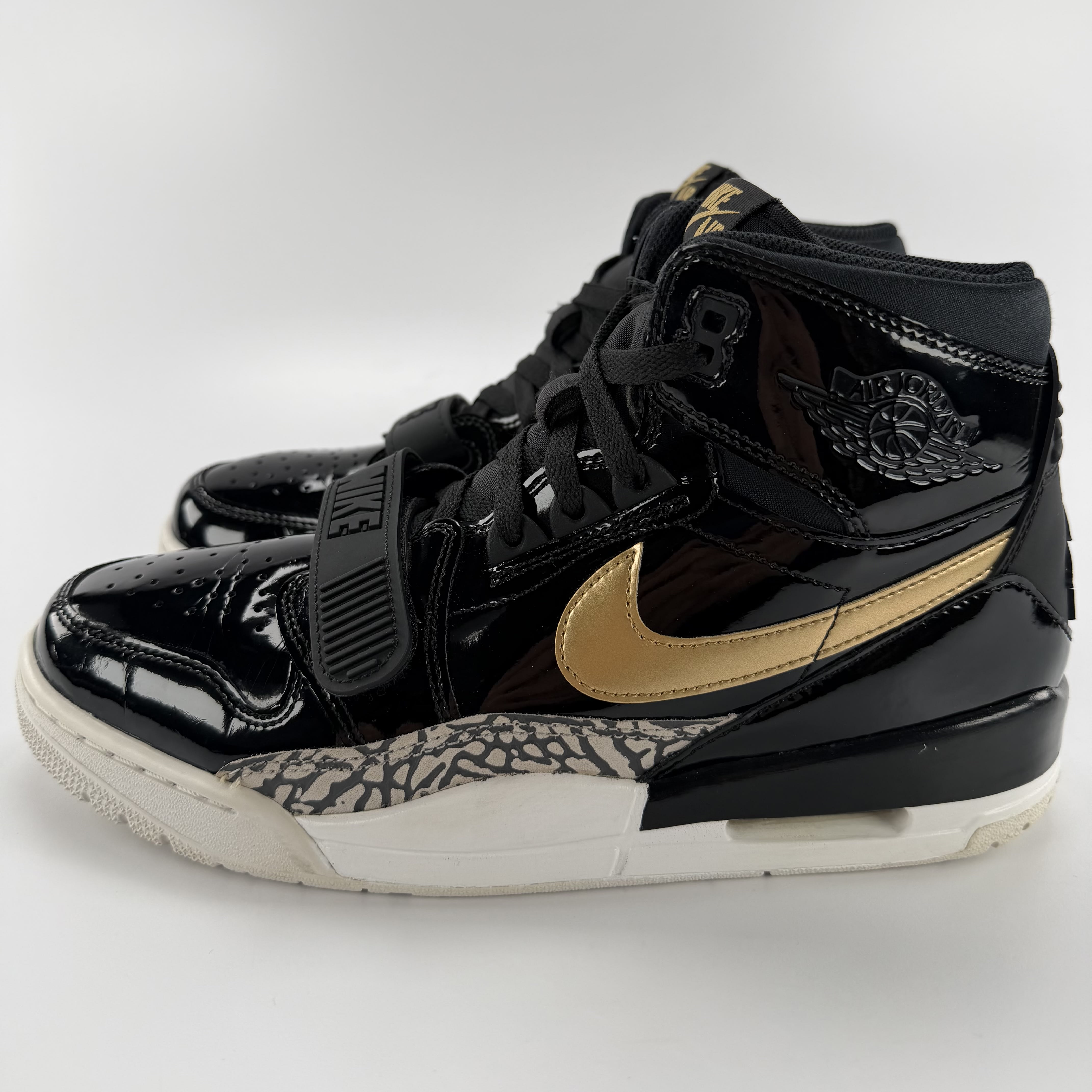 519148 Jordan Legacy 312 Black Gold Patent