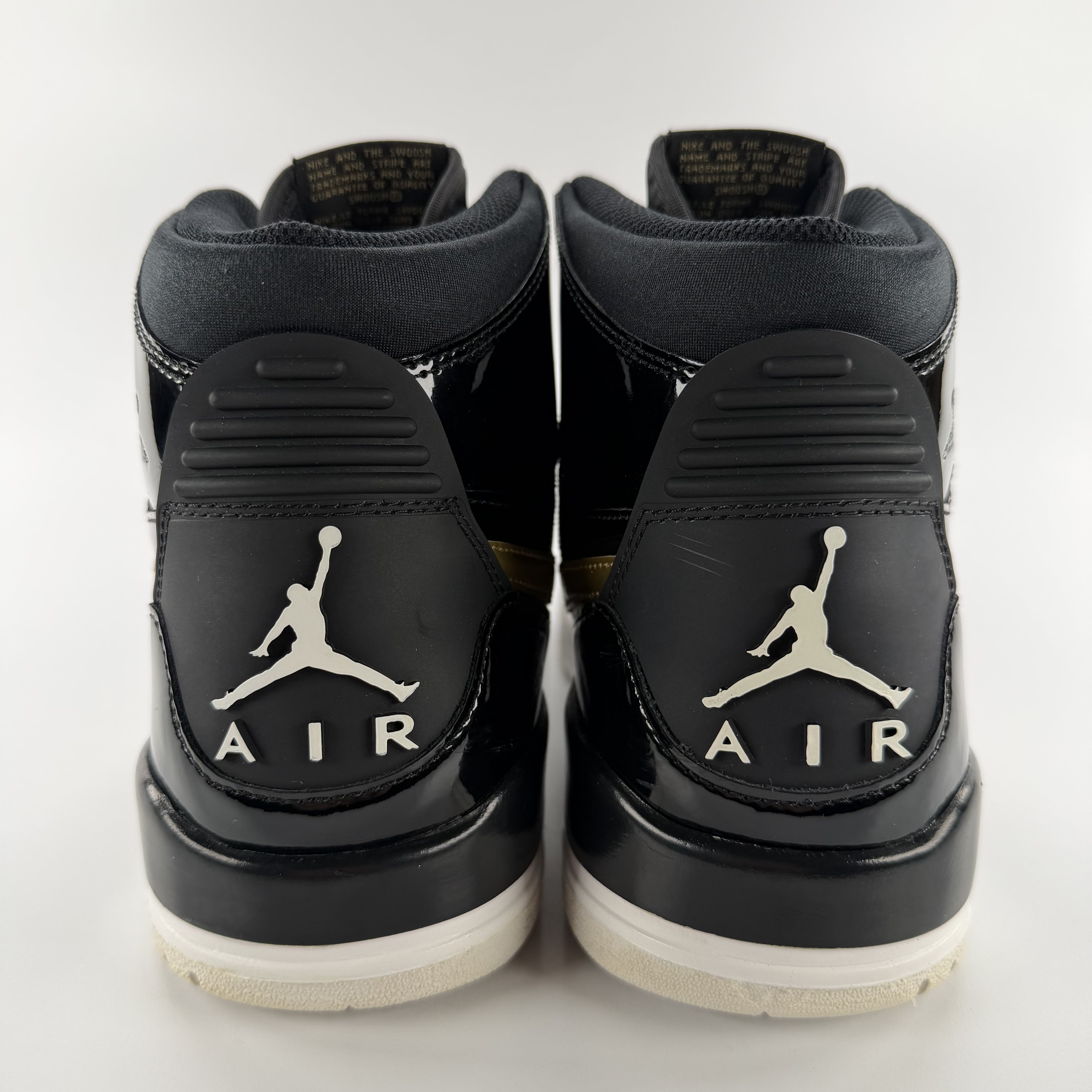 519148 Jordan Legacy 312 Black Gold Patent