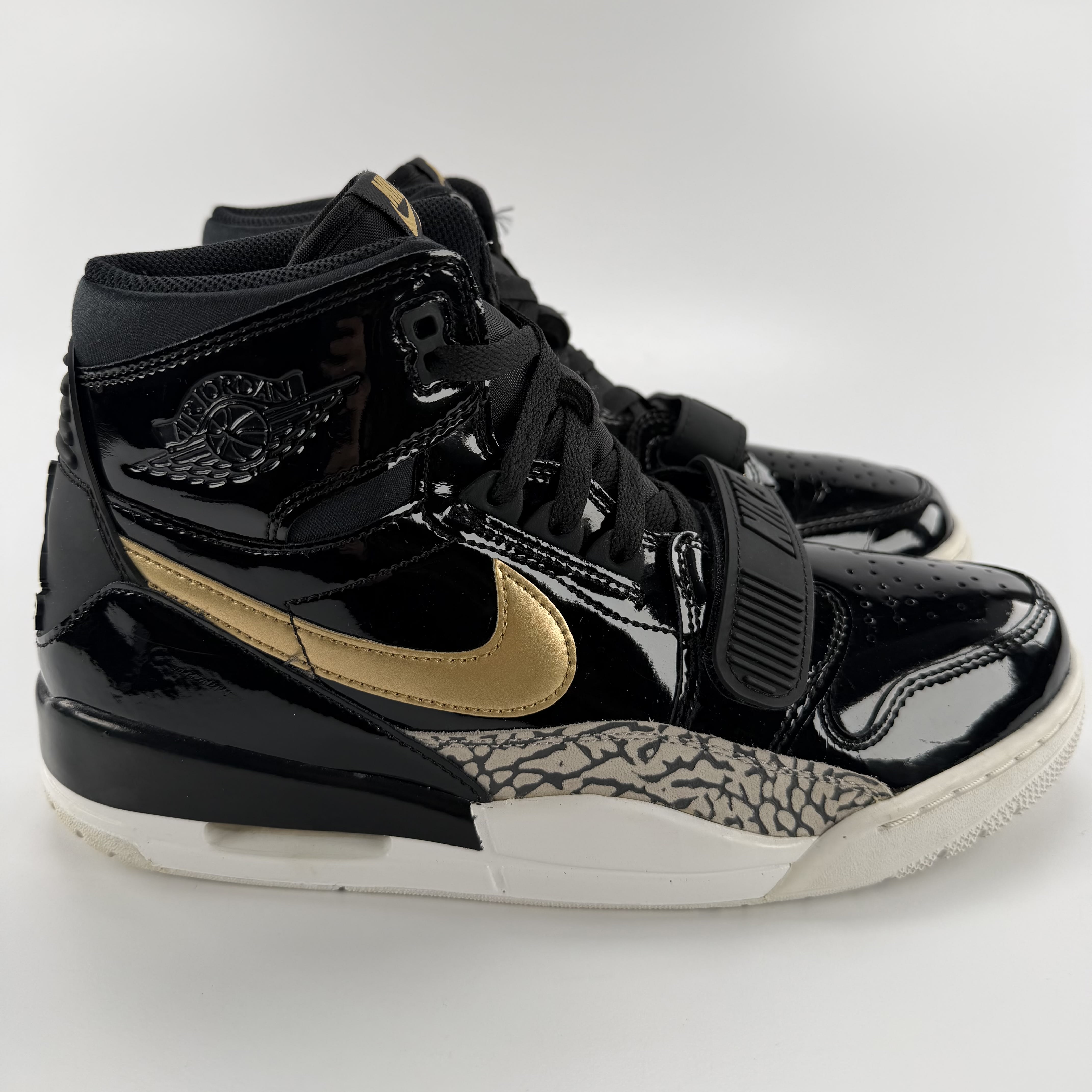 519148 Jordan Legacy 312 Black Gold Patent