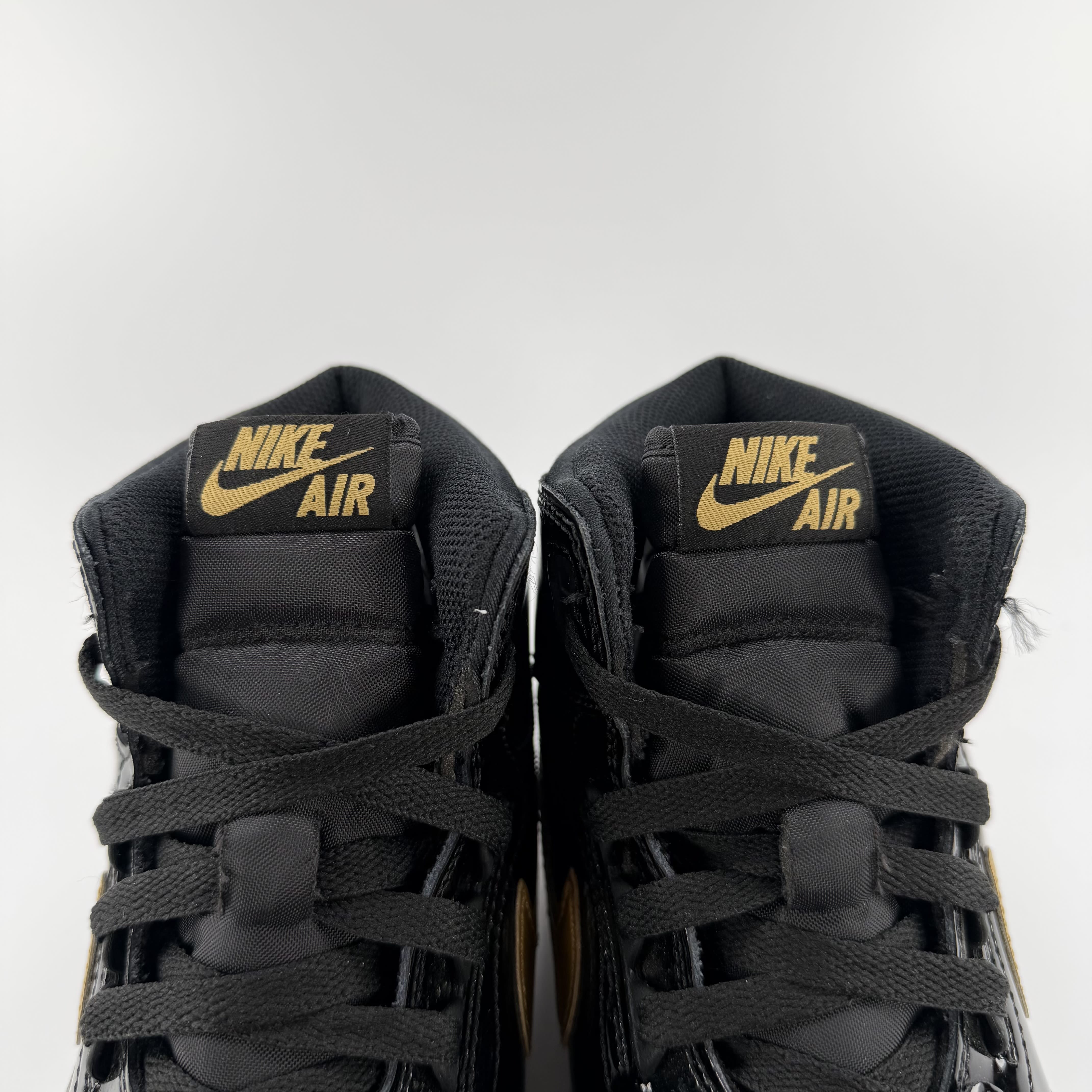 519148 Jordan Legacy 312 Black Gold Patent