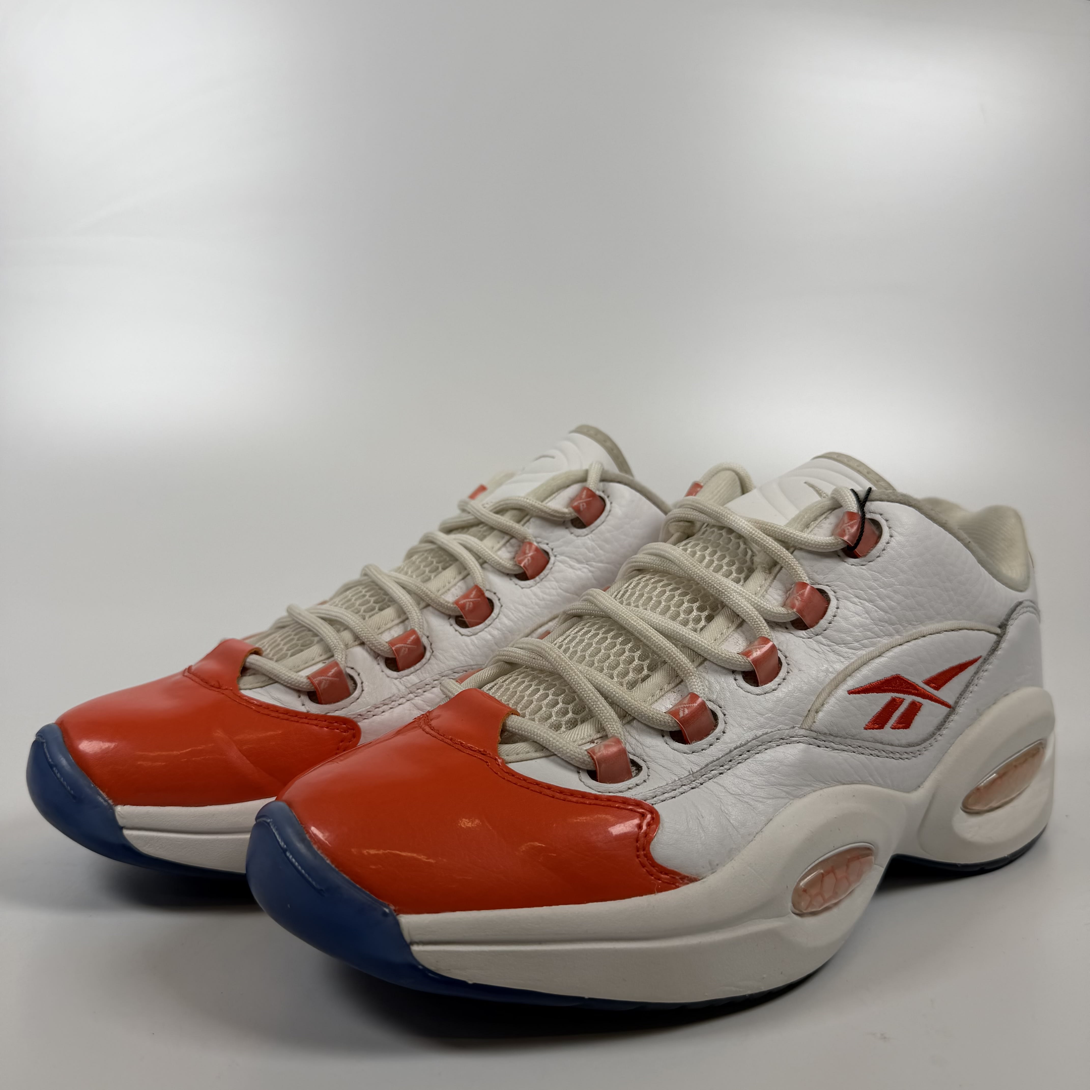 SP9028 Reebok Question Low Patent Toe Orange