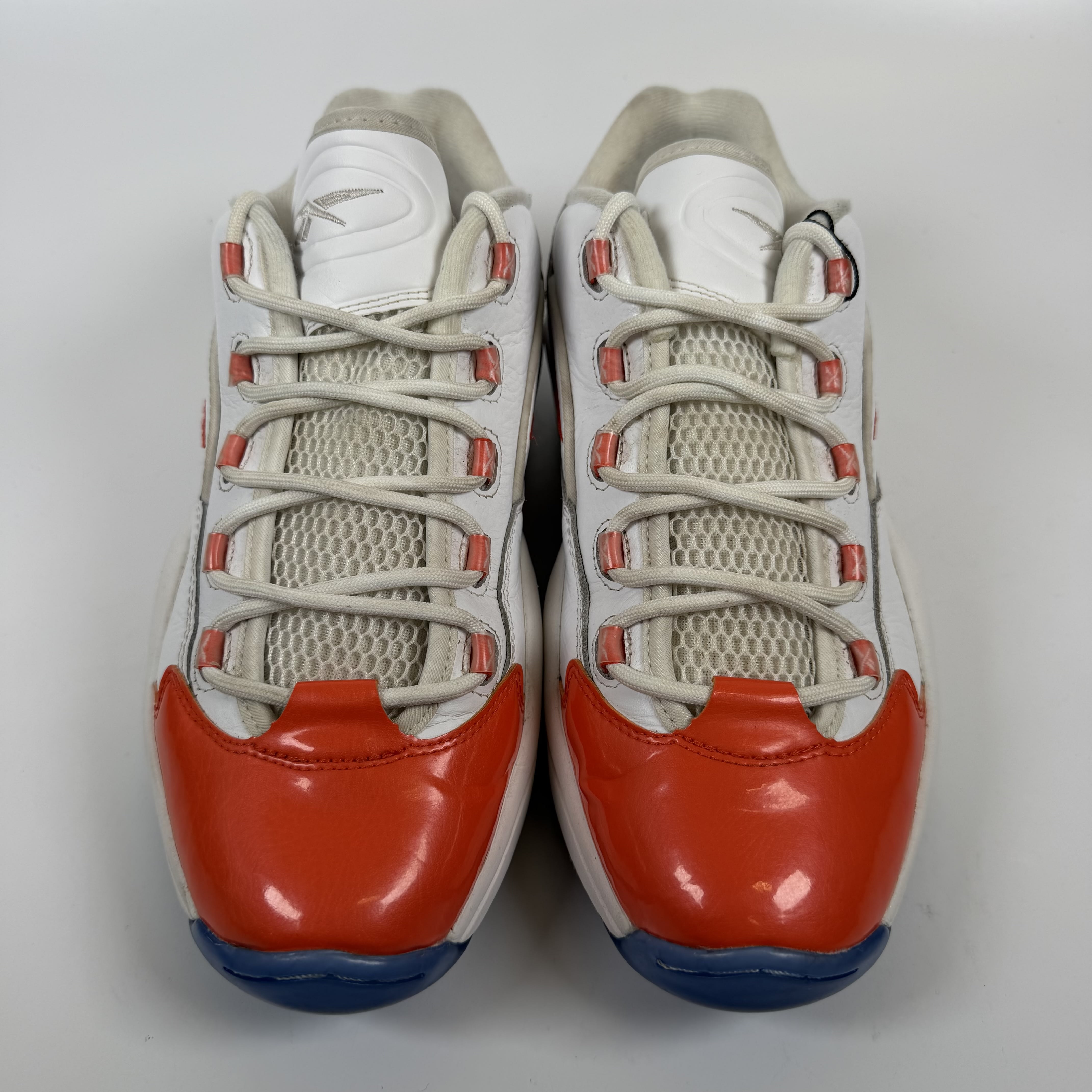 SP9028 Reebok Question Low Patent Toe Orange