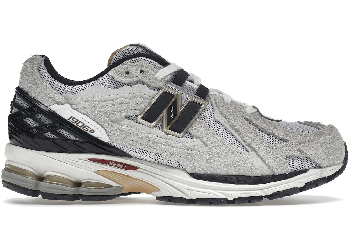 https://images.stockx.com/images/New-Balance-1906D-Protection-Pack-Reflection-Product.jpg?fit=fill&bg=FFFFFF&w=700&h=500&fm=webp&auto=compress&q=90&dpr=2&trim=color&updated_at=1738193358
