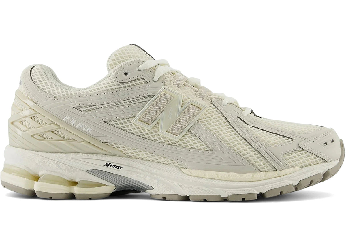 https://images.stockx.com/images/New-Balance-1906R-Neutral-Pack-Timberwolf.jpg?fit=fill&bg=FFFFFF&w=700&h=500&fm=webp&auto=compress&q=90&dpr=2&trim=color&updated_at=1749236582
