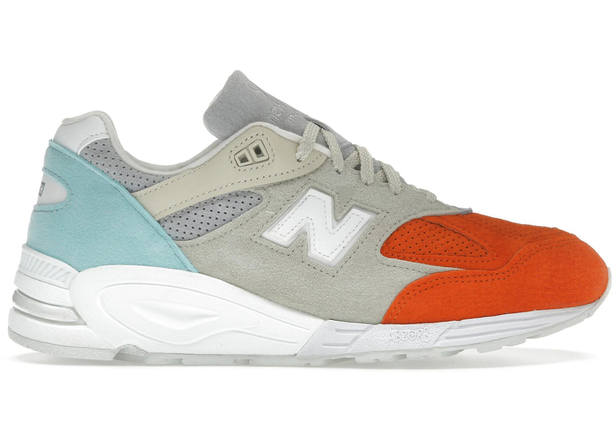 https://images.stockx.com/images/New-Balance-990v2-Kith-Cyclades-Product.jpg?fit=fill&bg=FFFFFF&w=700&h=500&fm=webp&auto=compress&q=90&dpr=2&trim=color&updated_at=1745961169