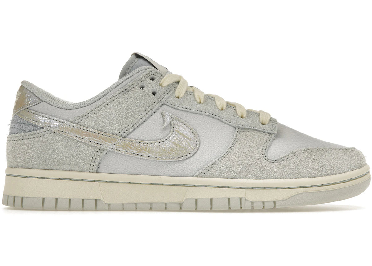 https://images.stockx.com/images/Nike-Dunk-Low-Gone-Fishing-Product.jpg?fit=fill&bg=FFFFFF&w=700&h=500&fm=webp&auto=compress&q=90&dpr=2&trim=color&updated_at=1738193358