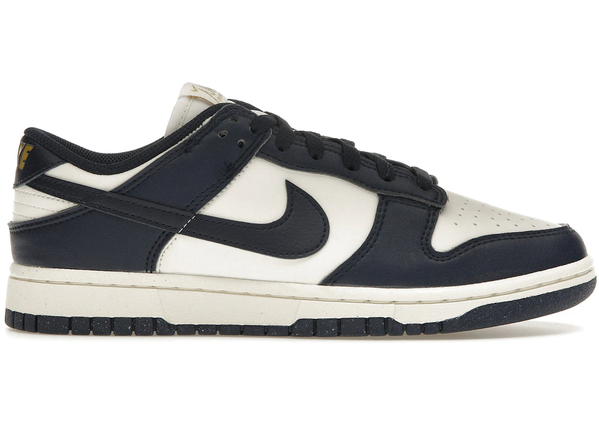 https://images.stockx.com/images/Nike-Dunk-Low-Next-Nature-Olympic-Womens-Product.jpg?fit=fill&bg=FFFFFF&w=700&h=500&fm=webp&auto=compress&q=90&dpr=2&trim=color&updated_at=1738193358