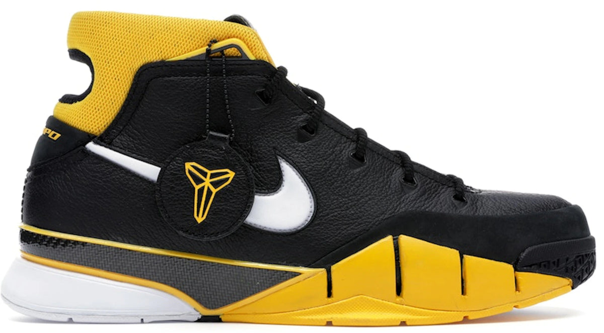 https://images.stockx.com/images/Nike-Kobe-1-Protro-Black-Maize-Product.jpg?fit=fill&bg=FFFFFF&w=1000&fm=webp&auto=compress&q=90&dpr=2&trim=color&updated_at=1786854918