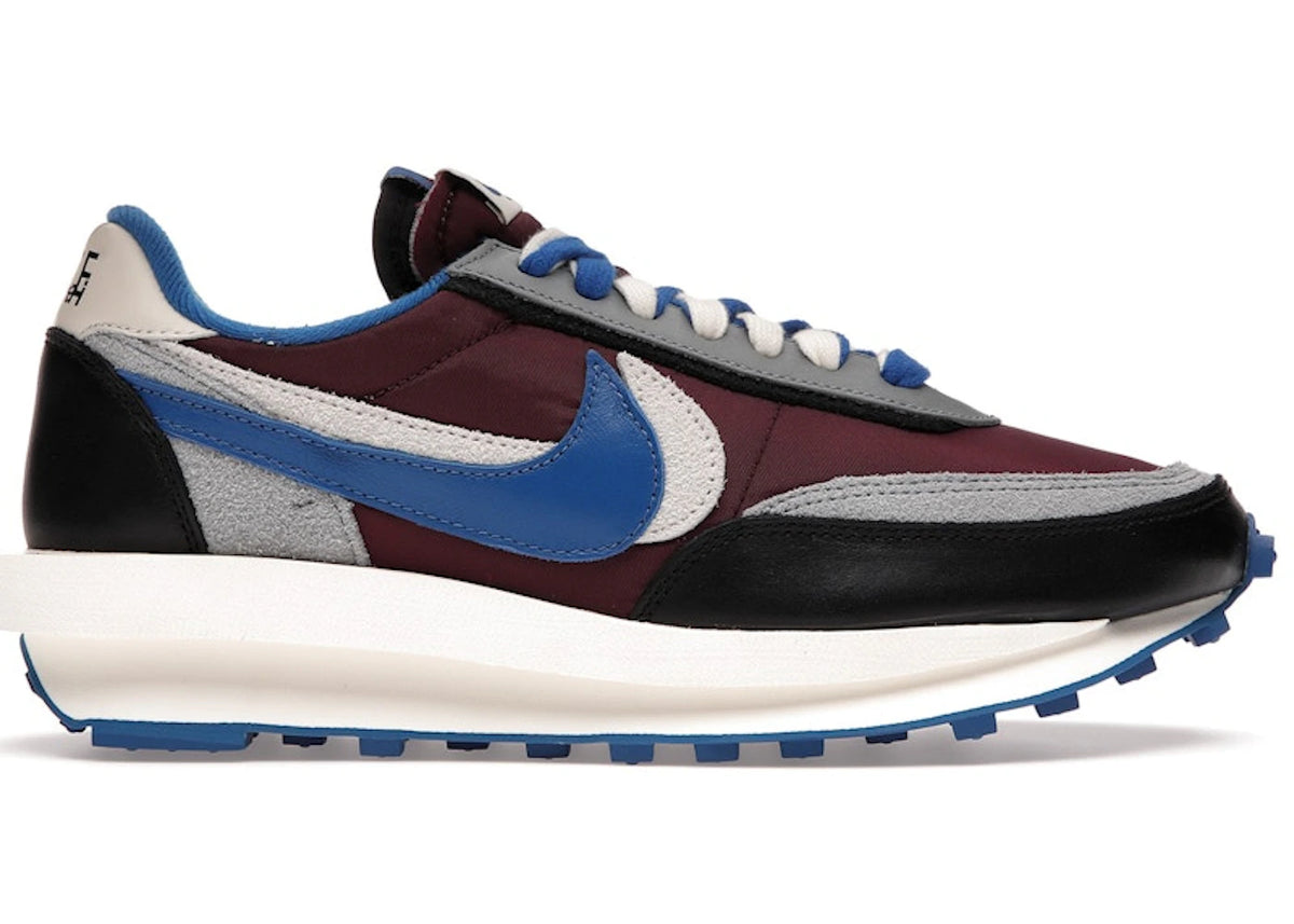 https://images.stockx.com/images/Nike-LD-Waffle-sacai-Undercover-Maroon-Product.jpg?fit=fill&bg=FFFFFF&w=700&h=500&fm=webp&auto=compress&q=90&dpr=2&trim=color&updated_at=1785264165