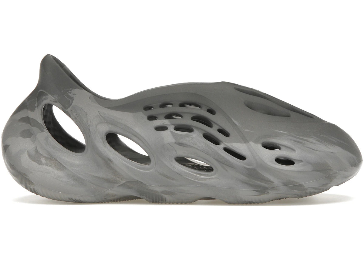 https://images.stockx.com/images/adidas-Yeezy-Foam-RNR-MX-Granite-Product.jpg?fit=fill&bg=FFFFFF&w=700&h=500&fm=webp&auto=compress&q=90&dpr=2&trim=color&updated_at=1738193358