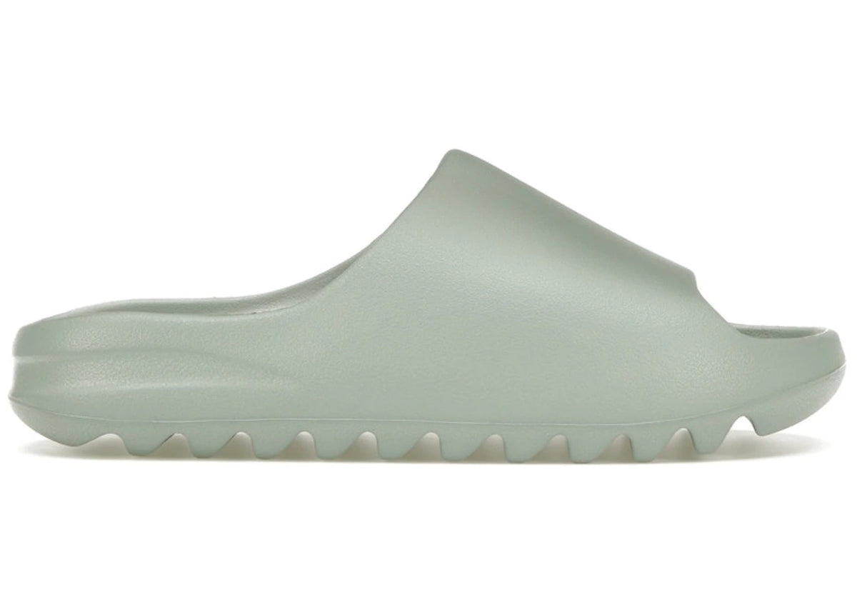 https://images.stockx.com/images/adidas-Yeezy-Slide-Salt-Product.jpg?fit=fill&bg=FFFFFF&w=700&h=500&fm=webp&auto=compress&q=90&dpr=2&trim=color&updated_at=1738193358