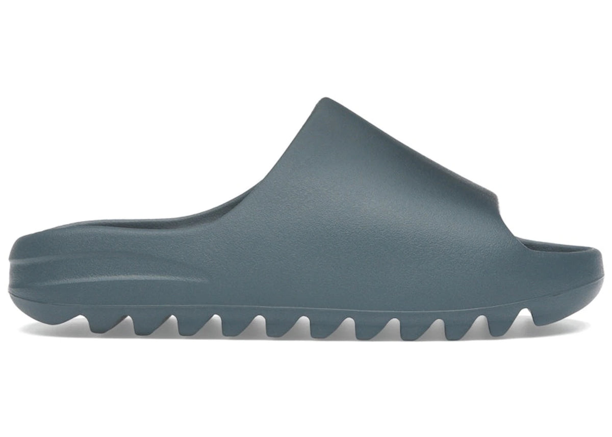 https://images.stockx.com/images/adidas-Yeezy-Slide-Slate-Marine-Product.jpg?fit=fill&bg=FFFFFF&w=700&h=500&fm=webp&auto=compress&q=90&dpr=2&trim=color&updated_at=1738193358